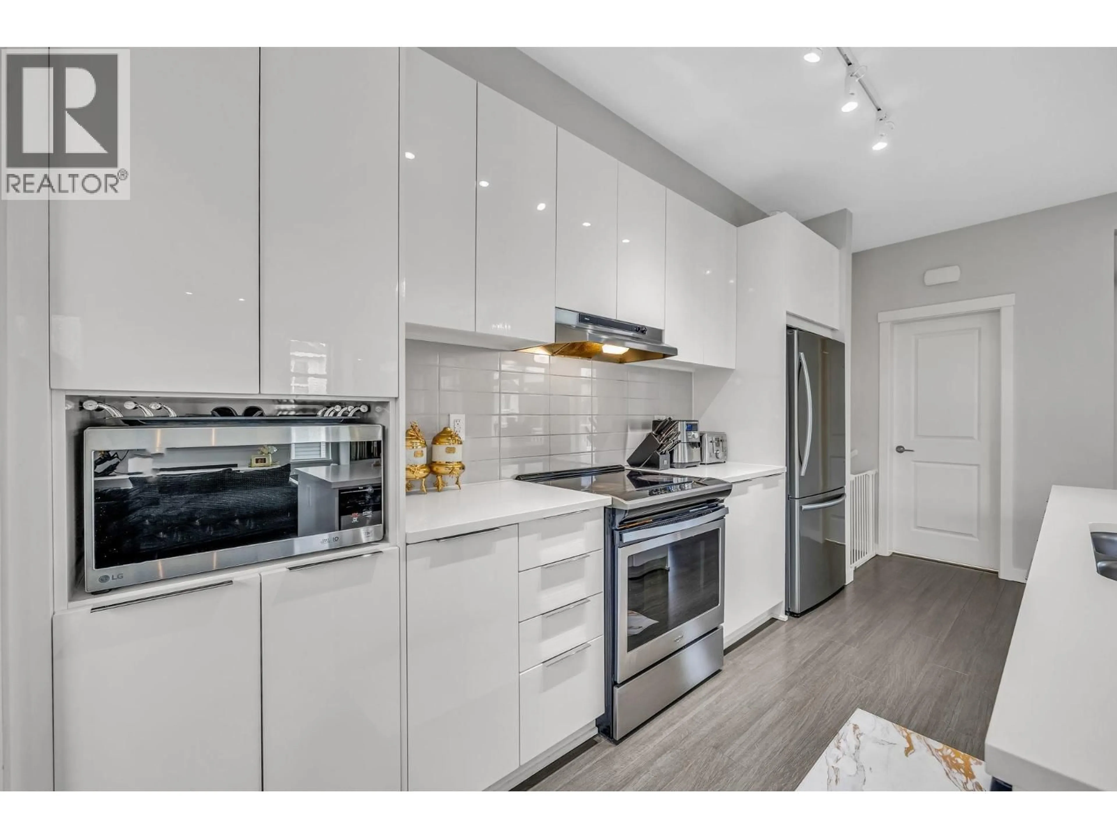 Open concept kitchen, unknown for 1505 - 11295 PAZARENA PLACE, Maple Ridge British Columbia V2X4K9