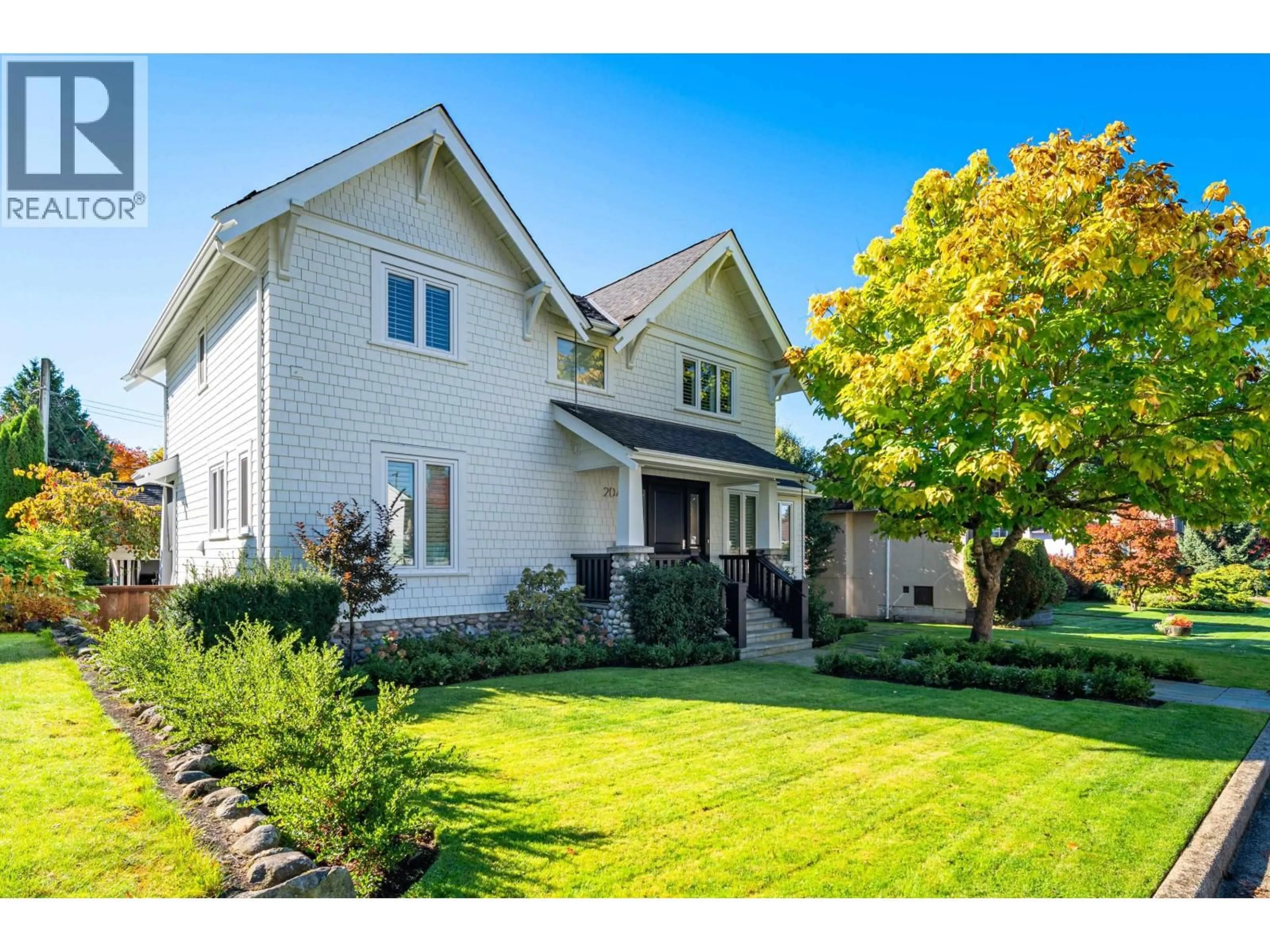 Home with vinyl exterior material, street for 2040 58TH AVENUE, Vancouver British Columbia V6P1X4