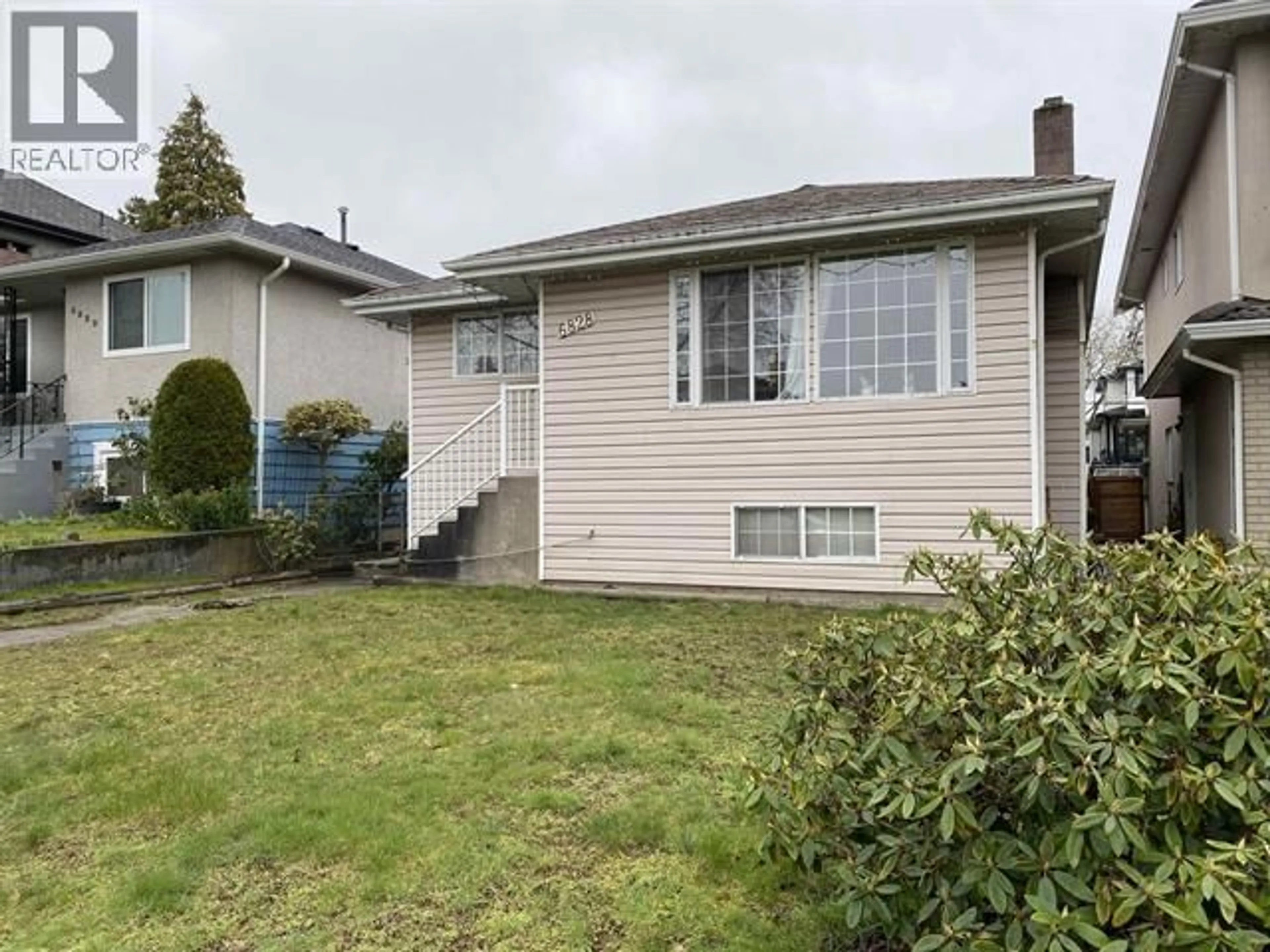 Home with vinyl exterior material, street for 6828 INVERNESS STREET, Vancouver British Columbia V5X4G2