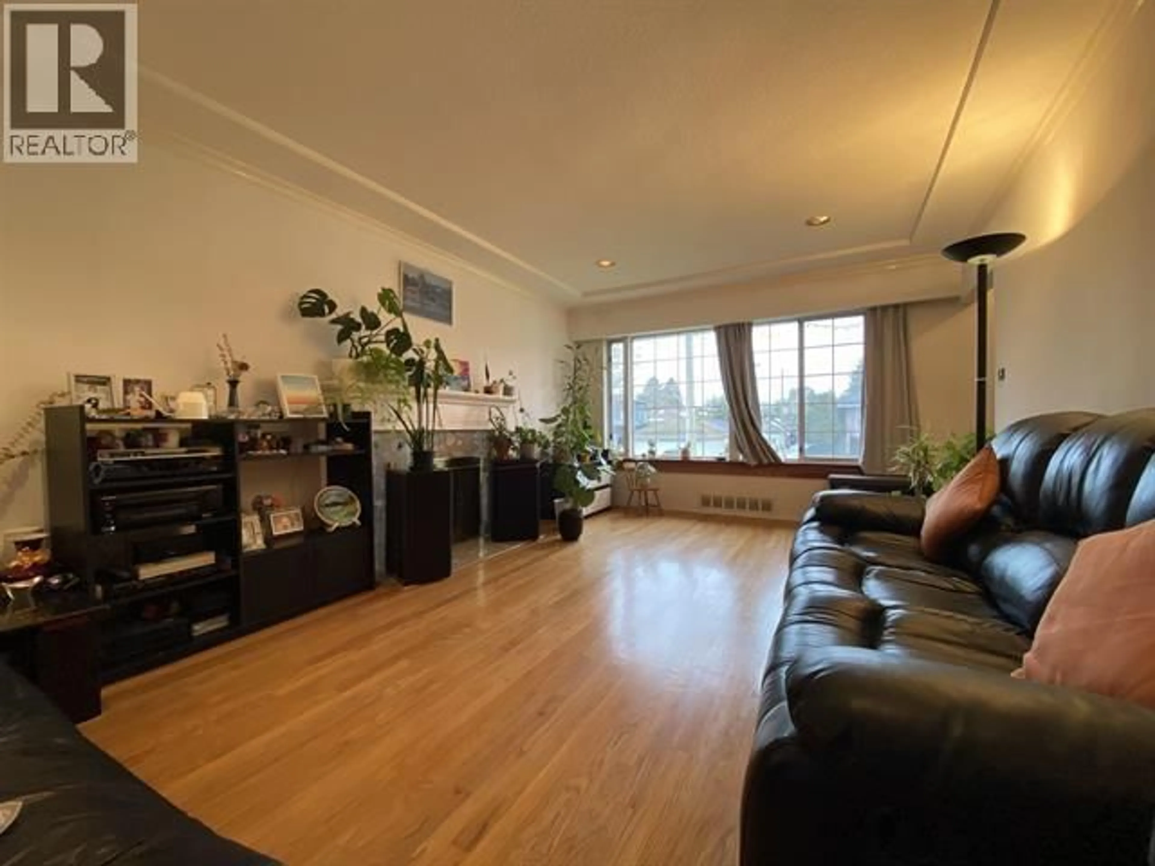 Living room with furniture, unknown for 6828 INVERNESS STREET, Vancouver British Columbia V5X4G2