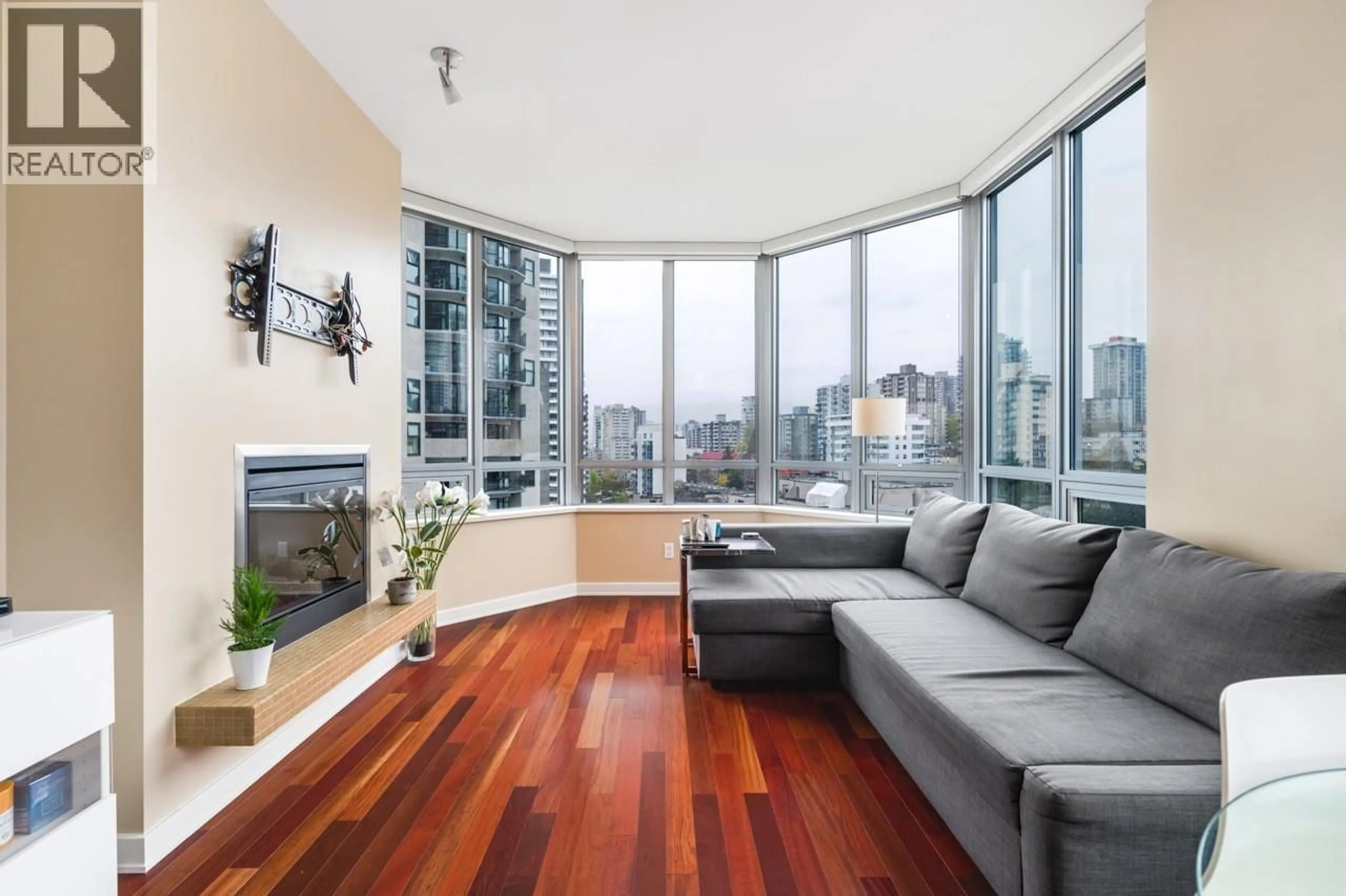 Living room with furniture, wood/laminate floor for 1206 - 1005 BEACH AVENUE, Vancouver British Columbia V6E3W2