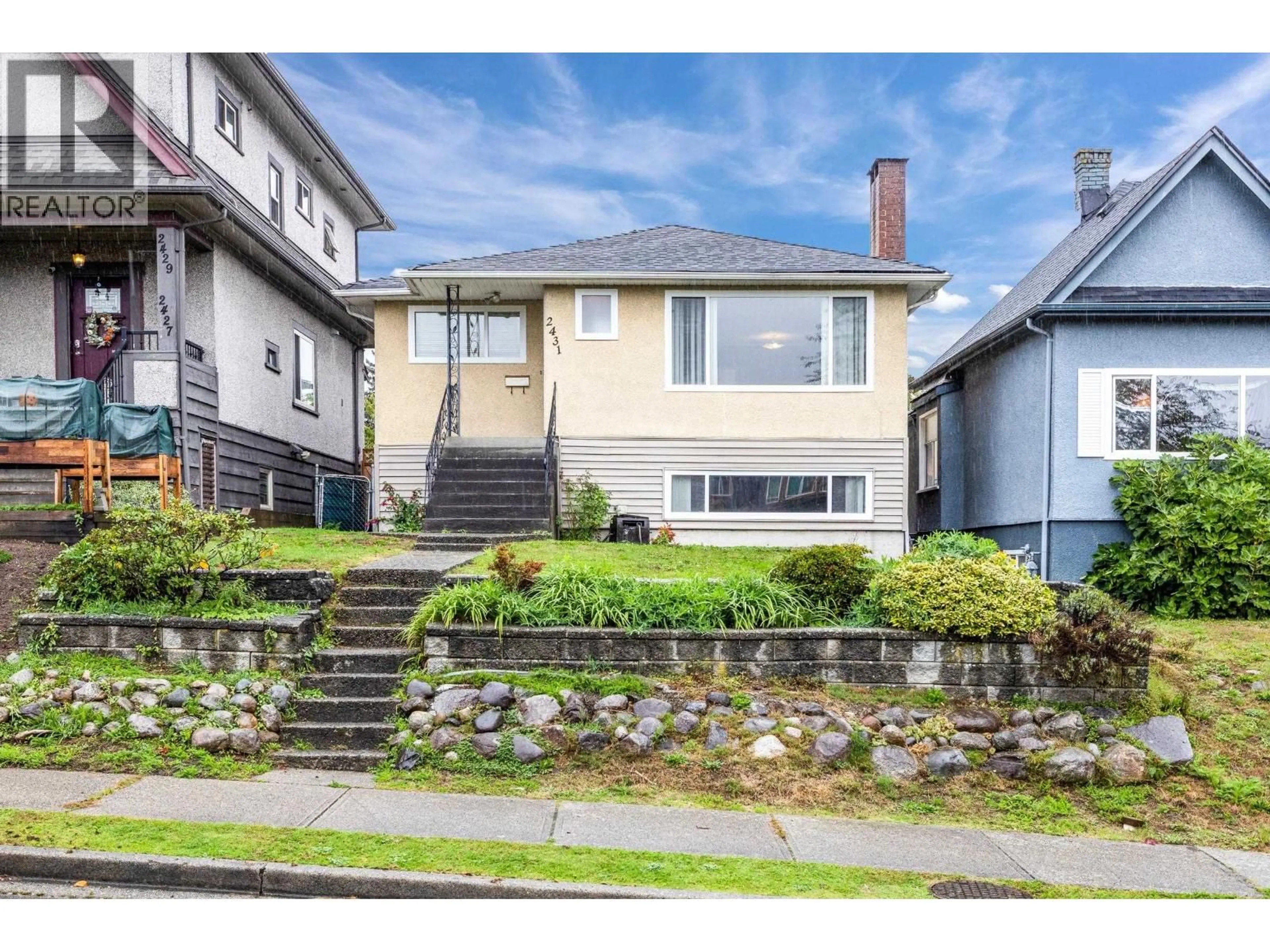 Home with vinyl exterior material, street for 2431 12TH AVENUE, Vancouver British Columbia V5M2C1
