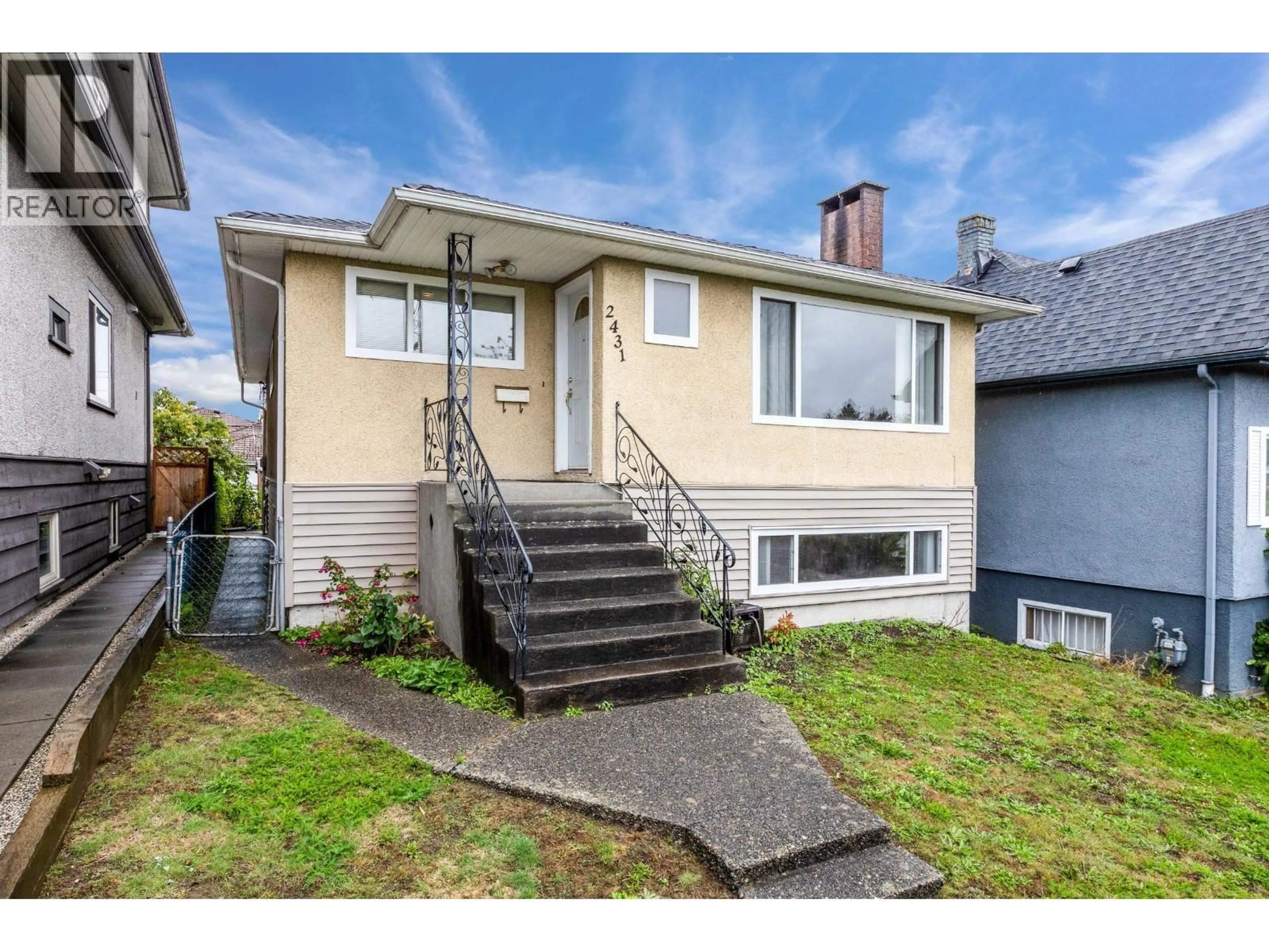 Home with vinyl exterior material, street for 2431 12TH AVENUE, Vancouver British Columbia V5M2C1