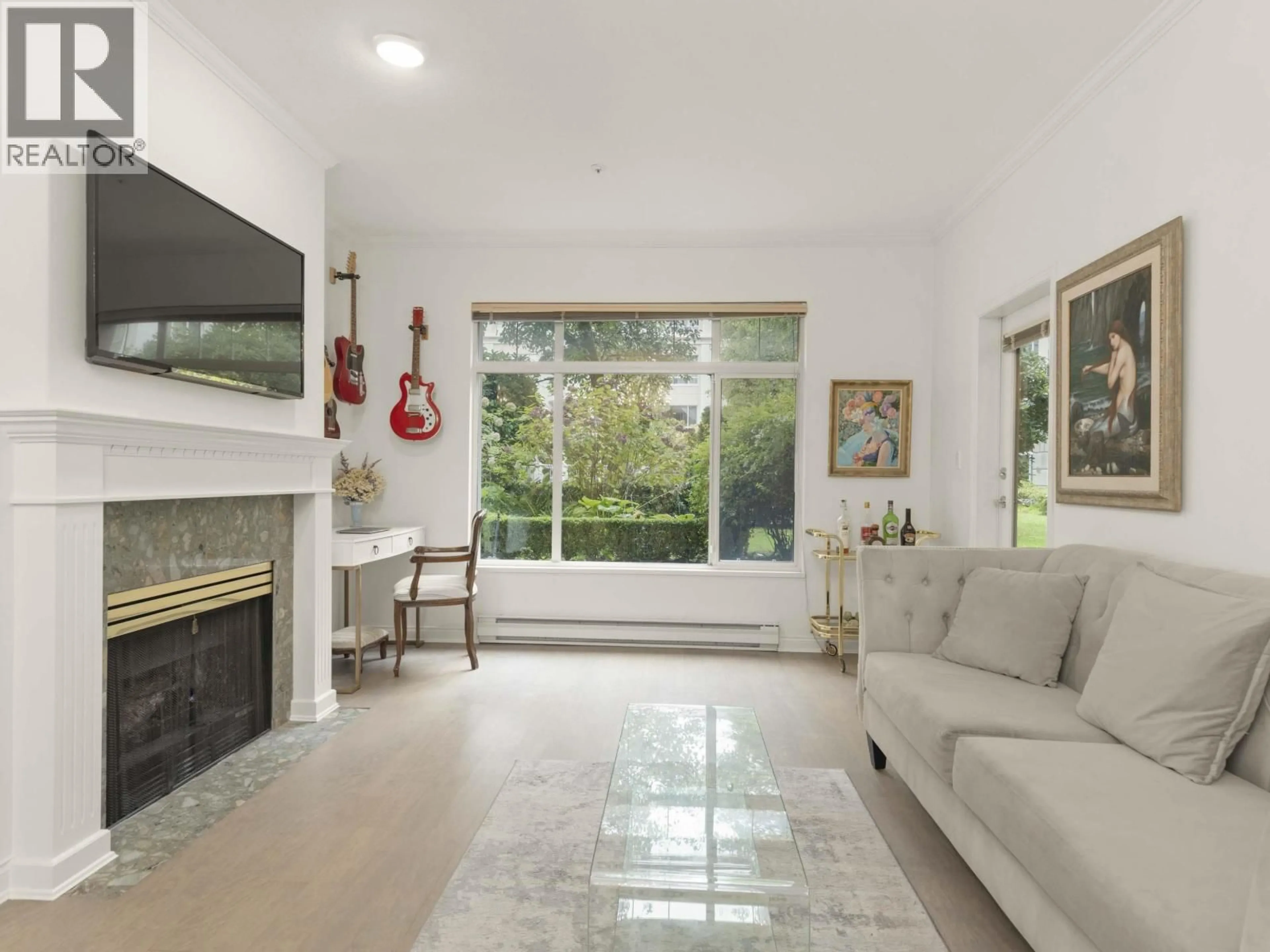 Living room with furniture, ceramic/tile floor for 109 - 5735 HAMPTON PLACE, Vancouver British Columbia V6T2G8