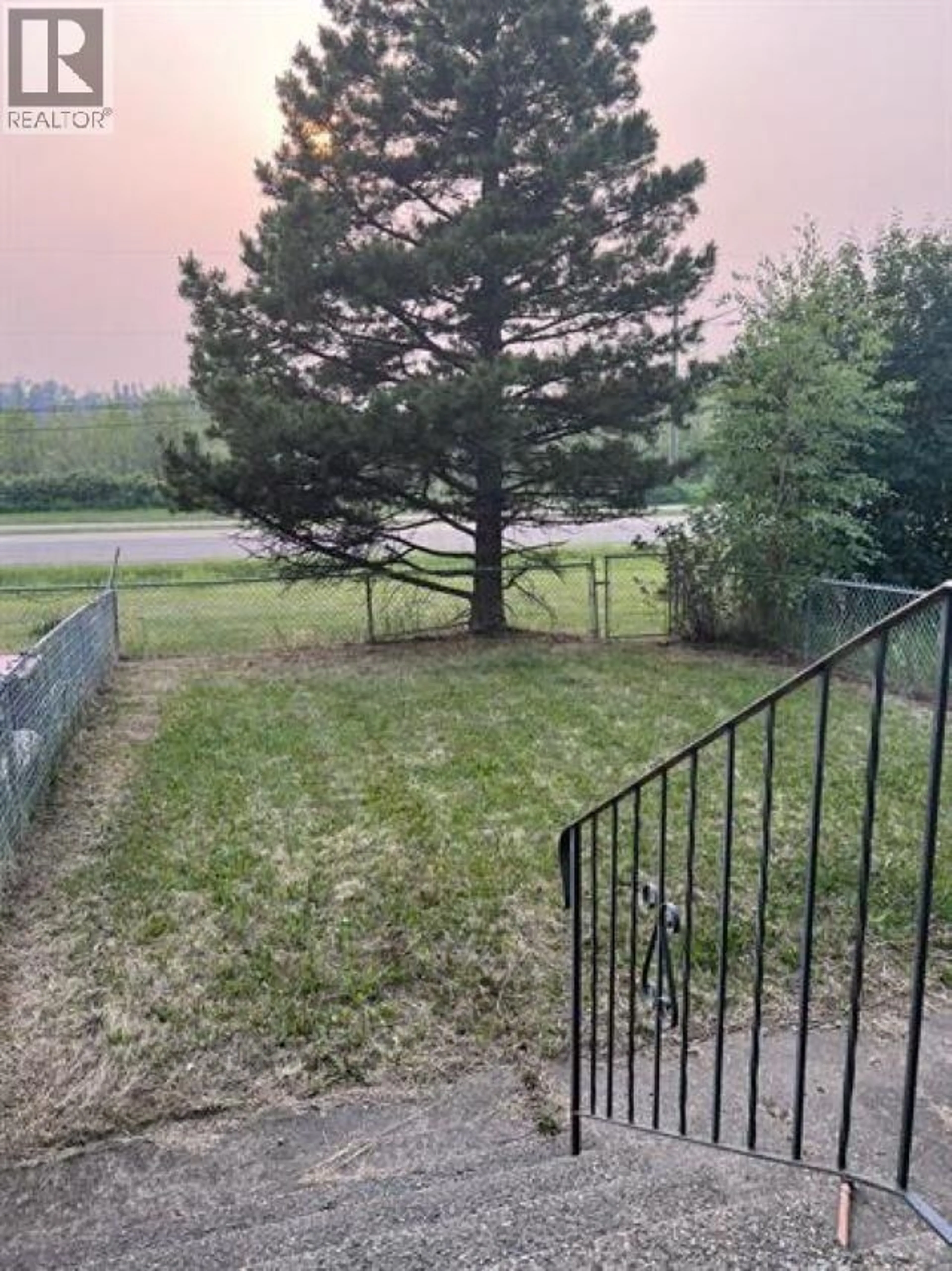 A pic from outside/outdoor area/front of a property/back of a property/a pic from drone, water/lake/river/ocean view for 74 - 5550 SIMPSON TRAIL, Fort Nelson British Columbia V0C1R0