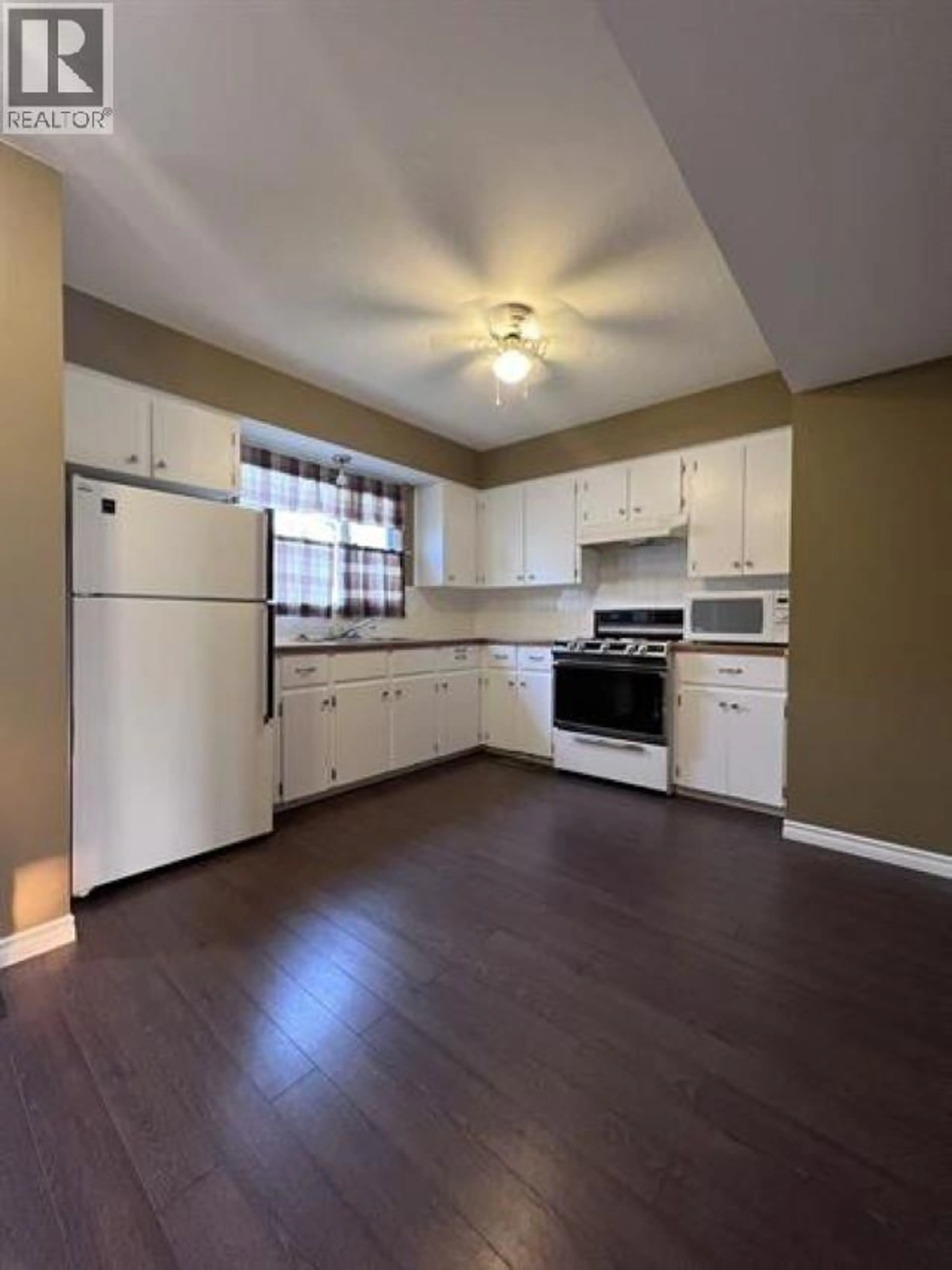 Standard kitchen, wood/laminate floor for 74 - 5550 SIMPSON TRAIL, Fort Nelson British Columbia V0C1R0