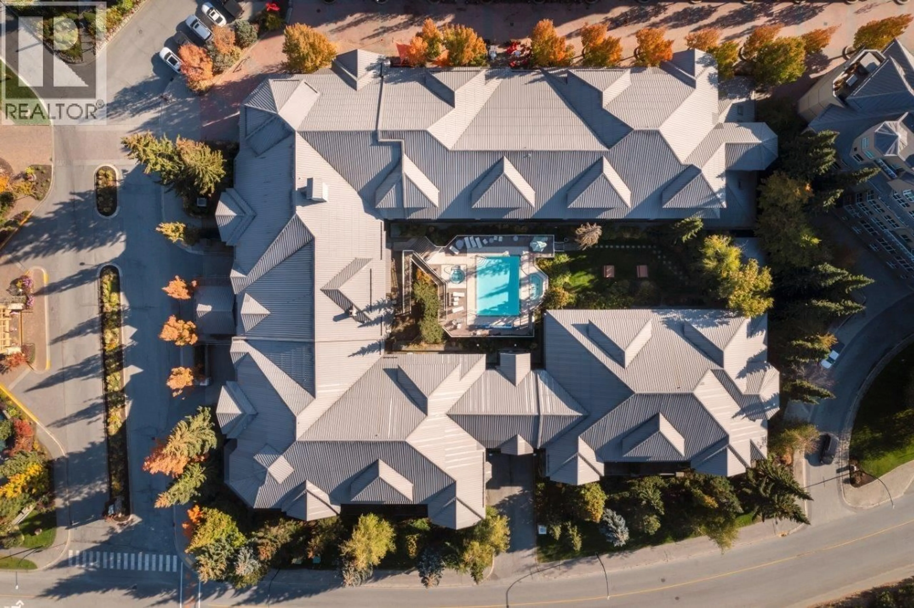 A pic from outside/outdoor area/front of a property/back of a property/a pic from drone, street for 321 - 4573 CHATEAU BOULEVARD, Whistler British Columbia V0N1B4