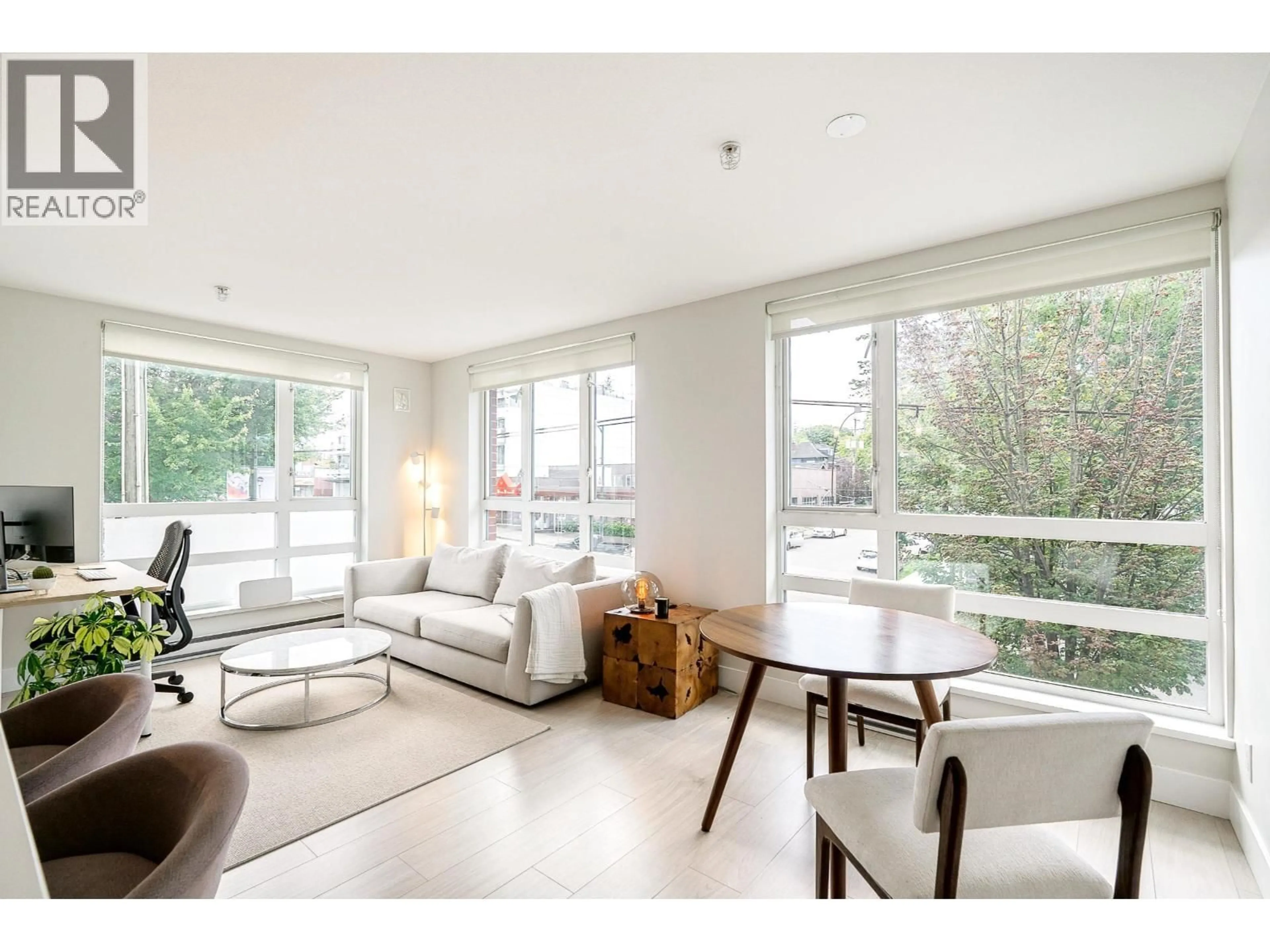 Living room with furniture, wood/laminate floor for 305 - 2477 CAROLINA STREET, Vancouver British Columbia V5T0G8