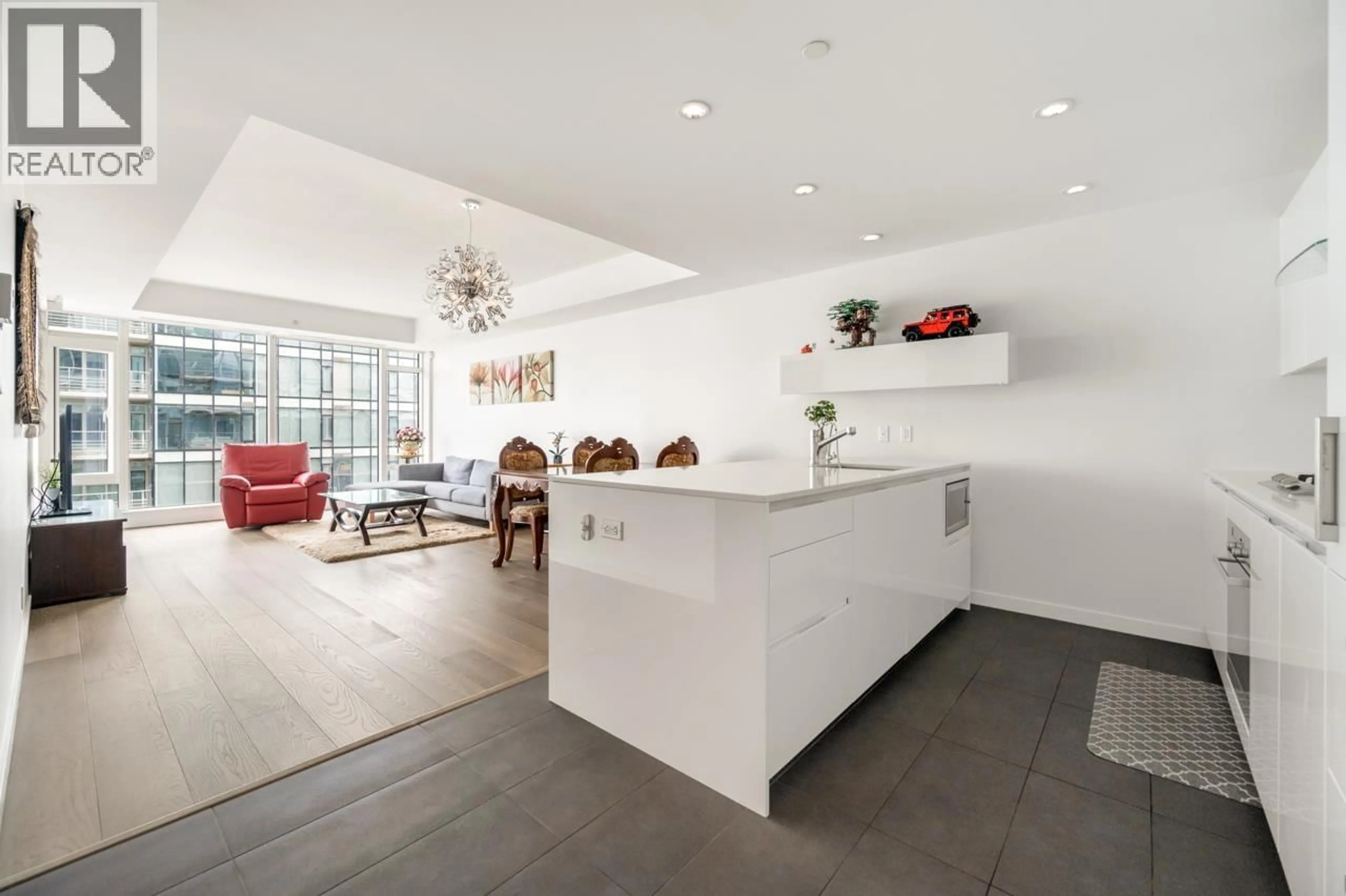 Open concept kitchen, ceramic/tile floor for 705 - 5177 BRIGHOUSE WAY, Richmond British Columbia V7C0A7