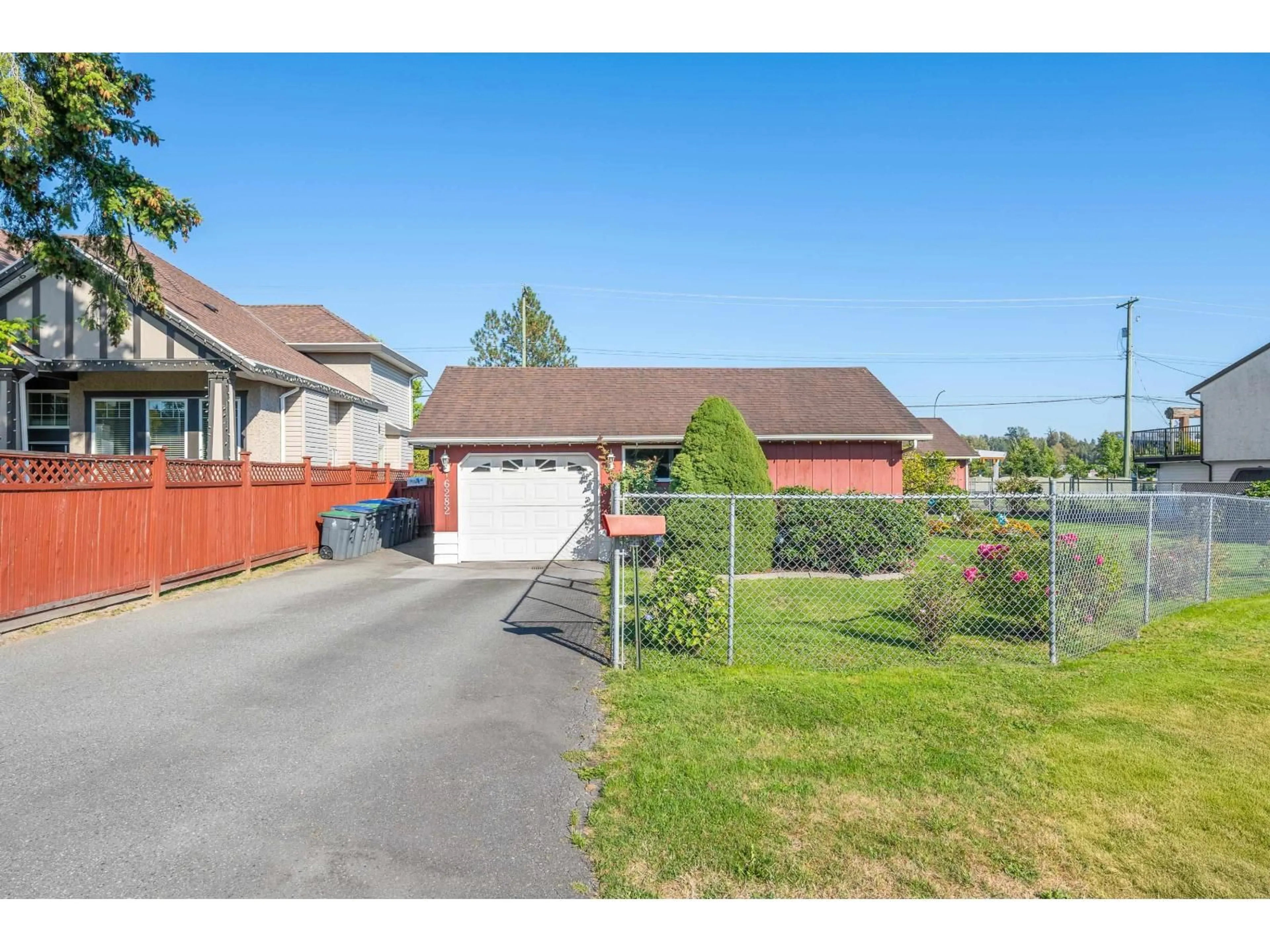 A pic from outside/outdoor area/front of a property/back of a property/a pic from drone, street for 6282 175B, Surrey British Columbia V3S5Z4