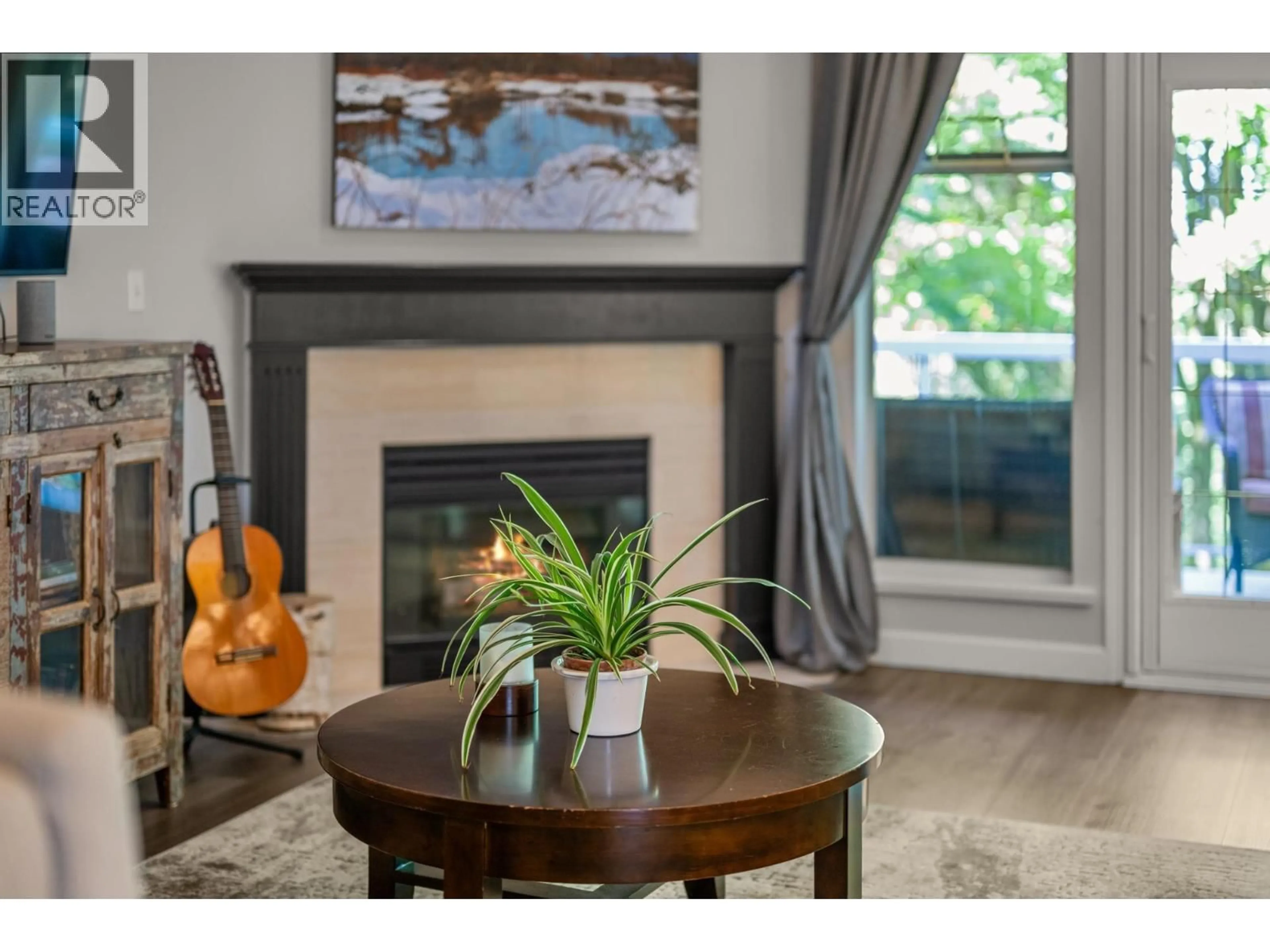 Living room with furniture, wood/laminate floor for 14 - 72 JAMIESON COURT, New Westminster British Columbia V3L5R6