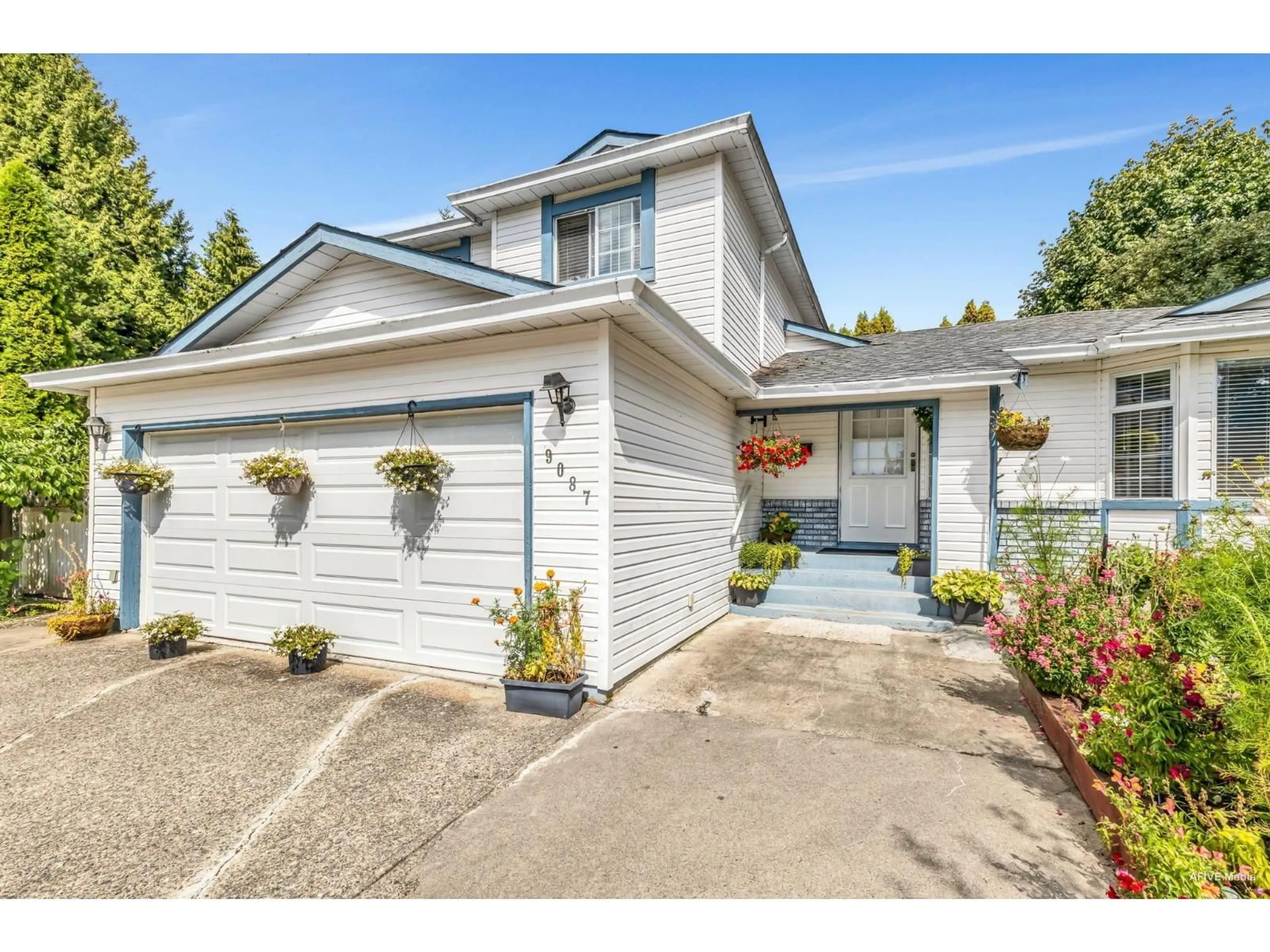 Home with vinyl exterior material, street for 9087 144, Surrey British Columbia V3V5Z8