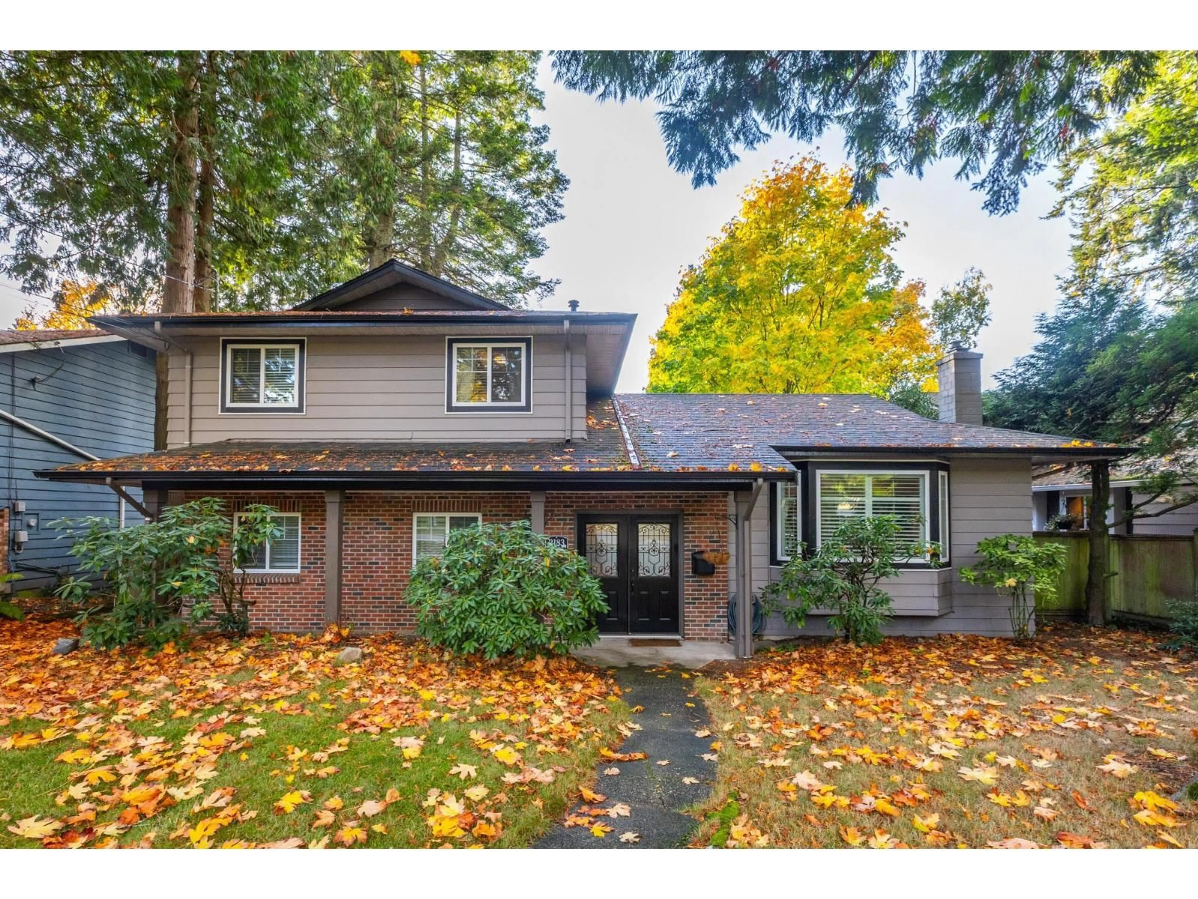 Home with vinyl exterior material, street for 2183 128, Surrey British Columbia V4A3V7
