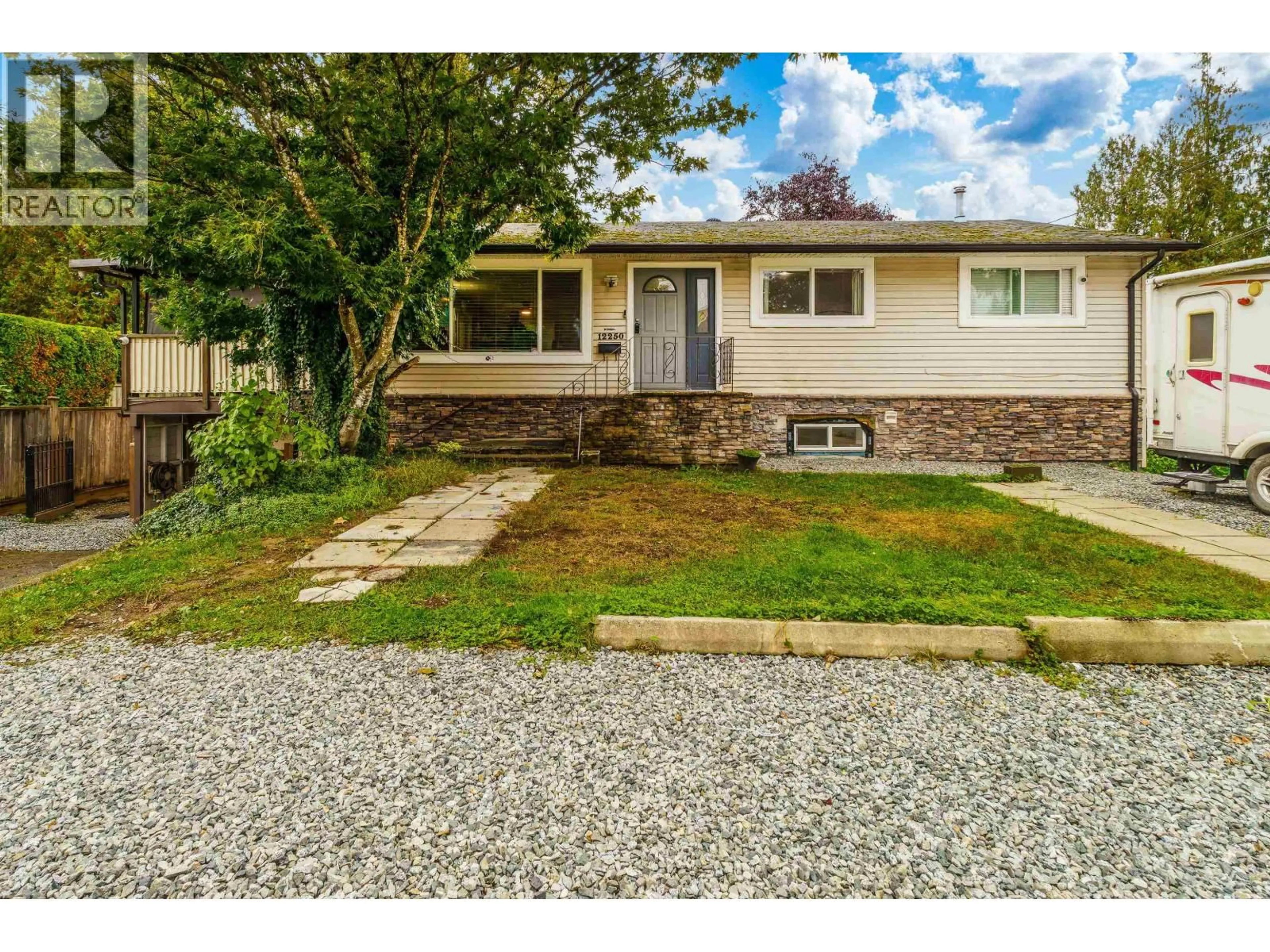 Home with vinyl exterior material, street for 12250 218 STREET, Maple Ridge British Columbia V2X5M5