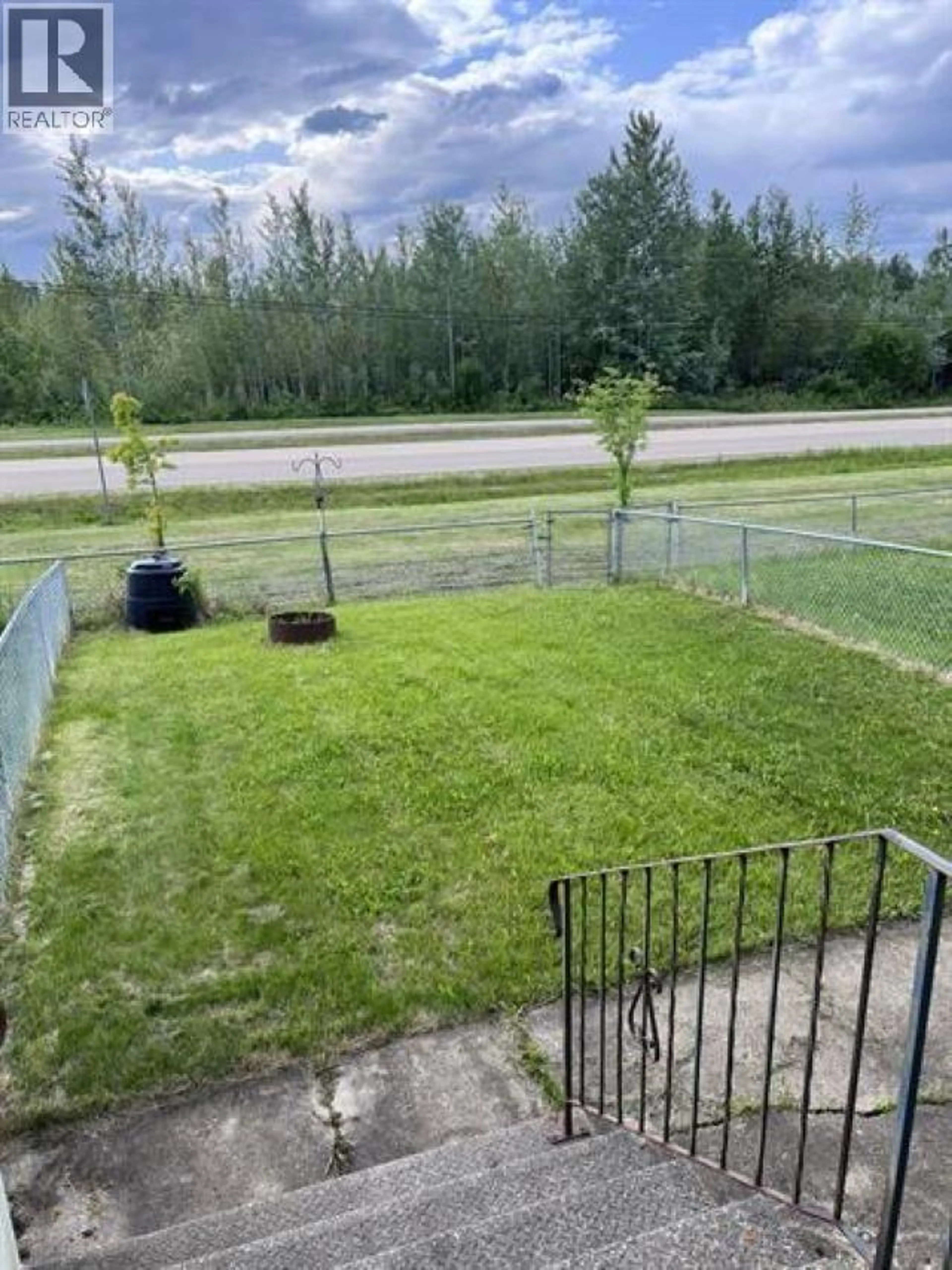 A pic from outside/outdoor area/front of a property/back of a property/a pic from drone, unknown for 84 - 5550 SIMPSON TRAIL, Fort Nelson British Columbia V0C1R0