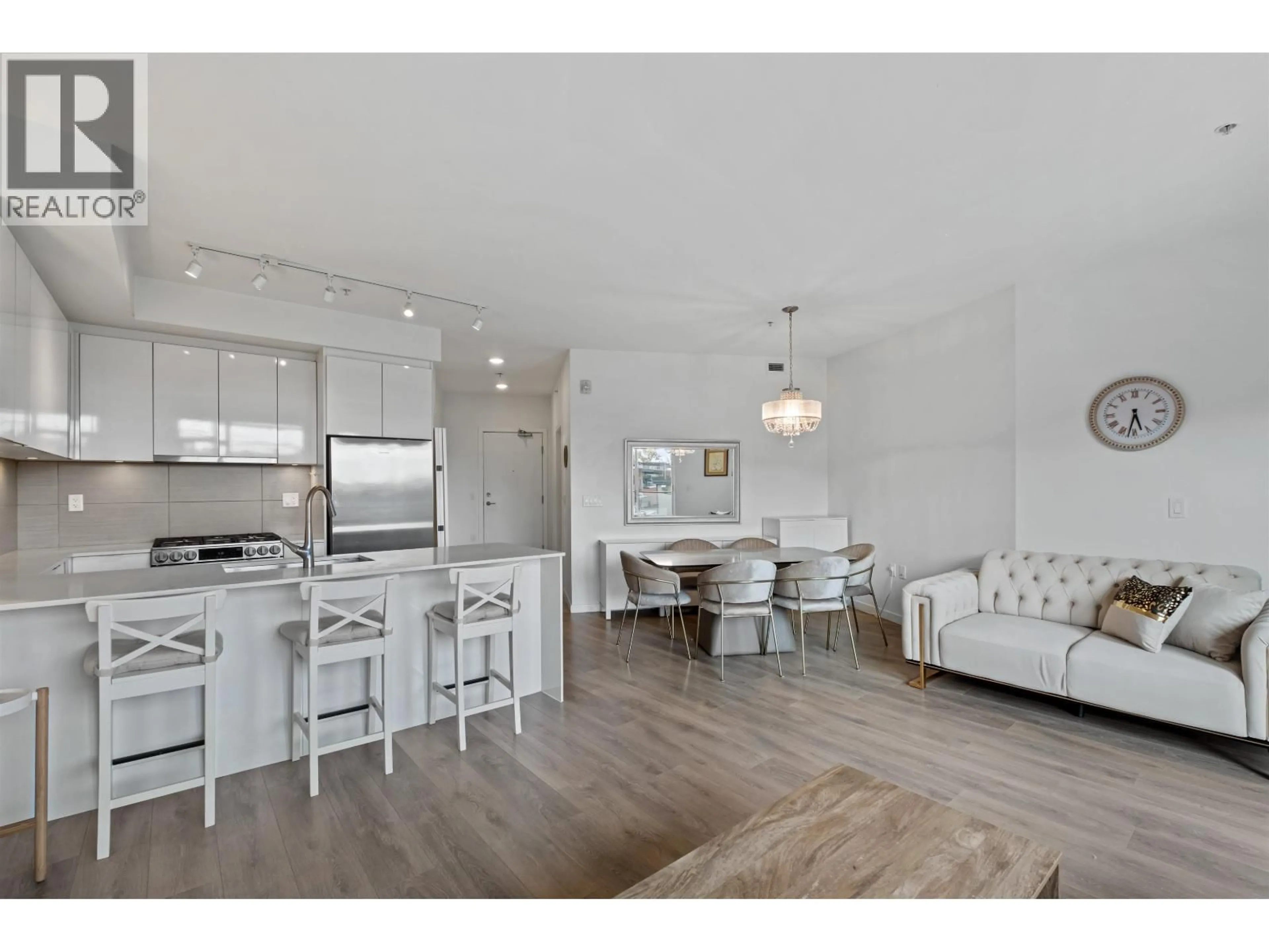 Open concept kitchen, wood/laminate floor for 505 - 725 MARINE DRIVE, North Vancouver British Columbia V7M0G2