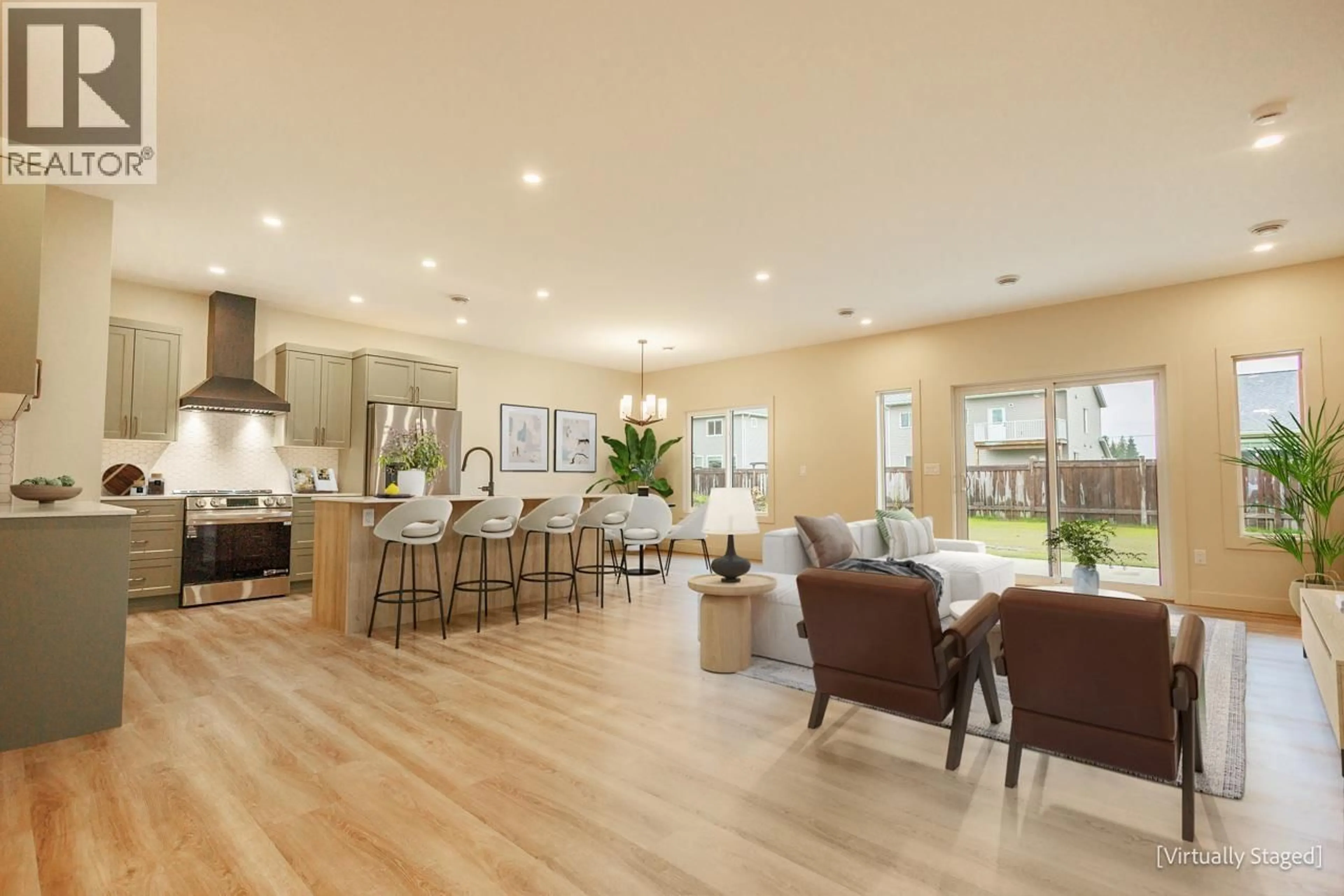 Open concept kitchen, wood/laminate floor for 4007 NASH DRIVE, Terrace British Columbia V8G0L3