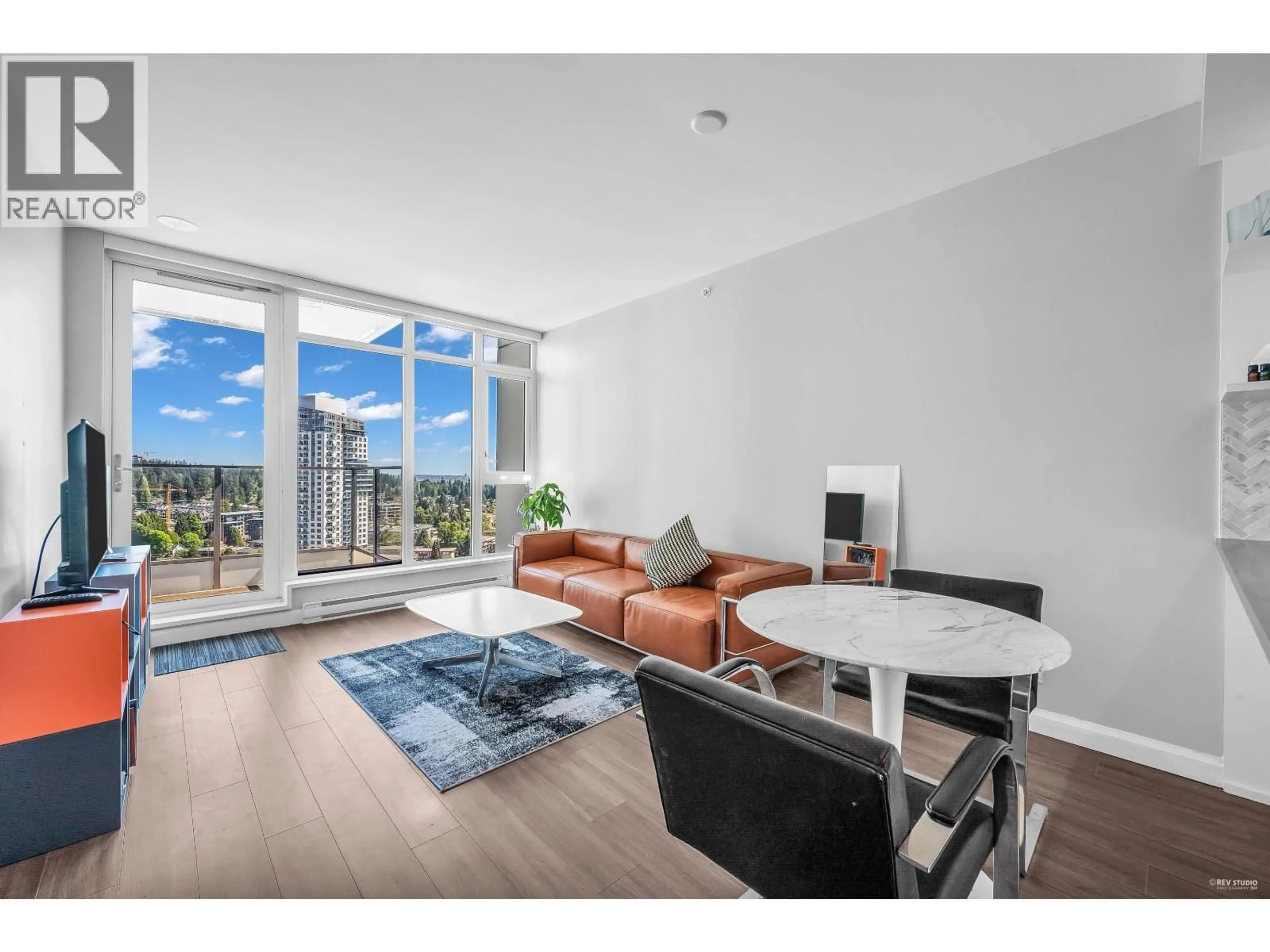 Living room with furniture, wood/laminate floor for 2508 - 520 COMO LAKE AVENUE, Coquitlam British Columbia V3J0E8