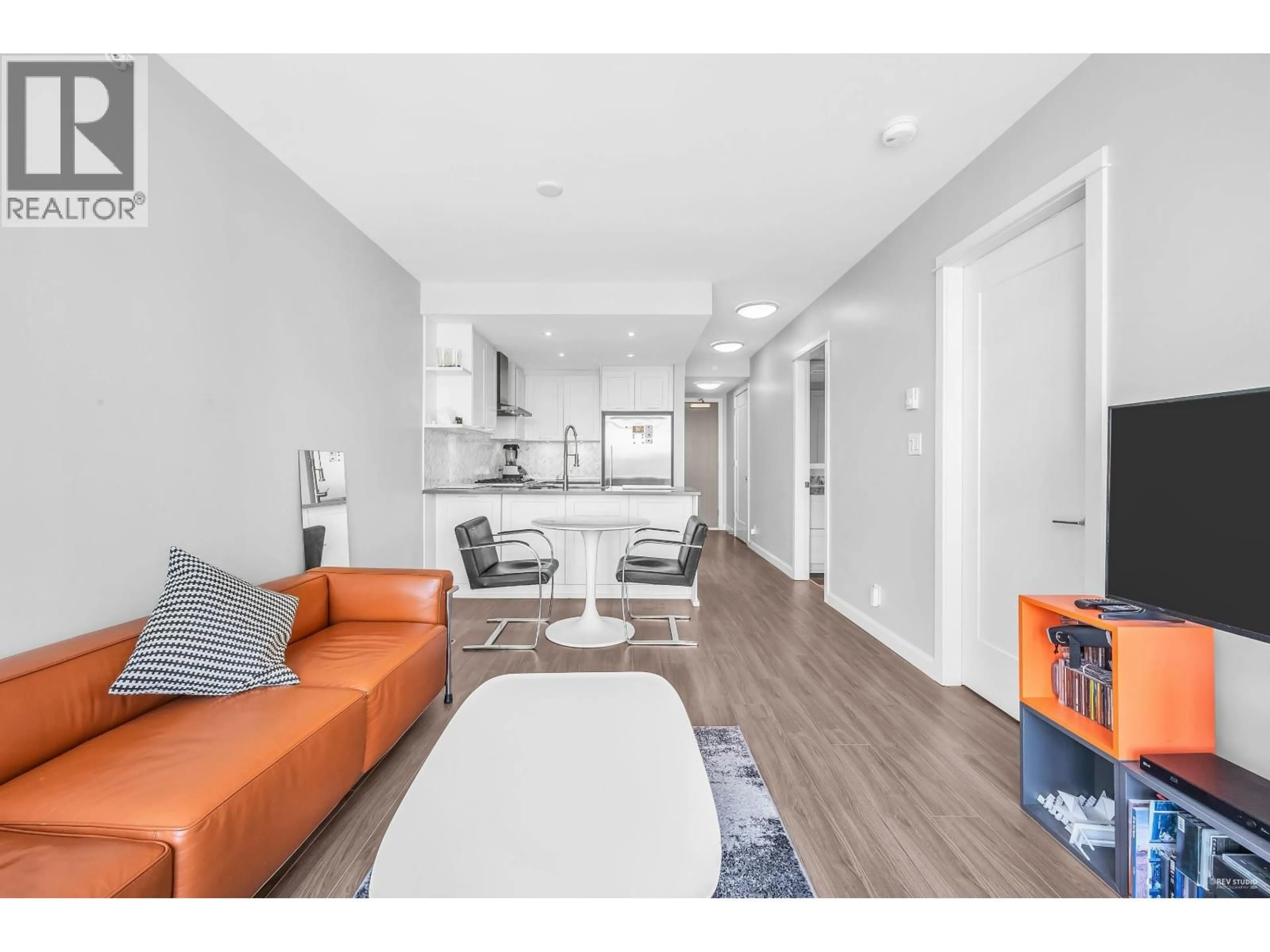 Living room with furniture, wood/laminate floor for 2508 - 520 COMO LAKE AVENUE, Coquitlam British Columbia V3J0E8