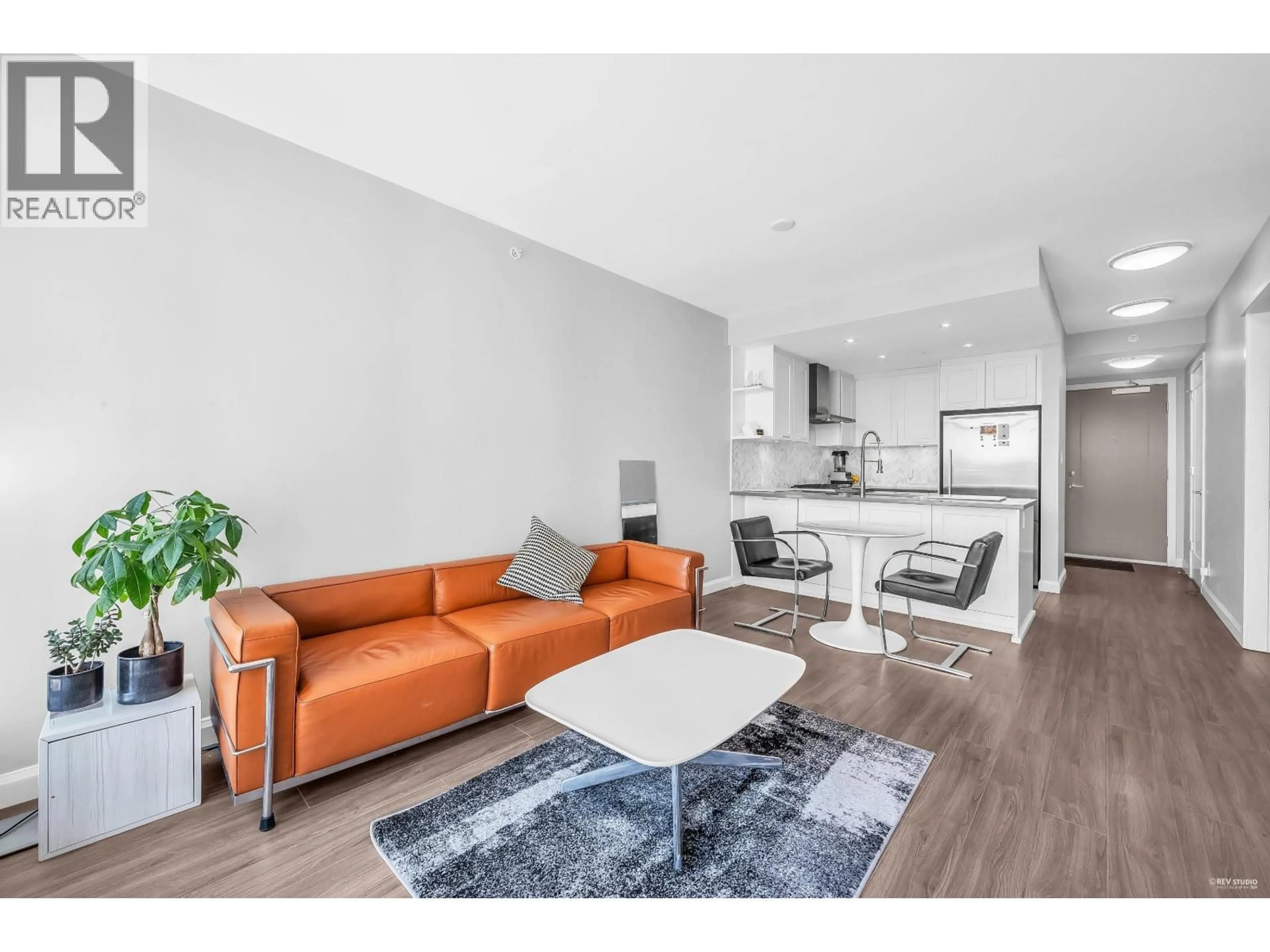 Living room with furniture, wood/laminate floor for 2508 - 520 COMO LAKE AVENUE, Coquitlam British Columbia V3J0E8