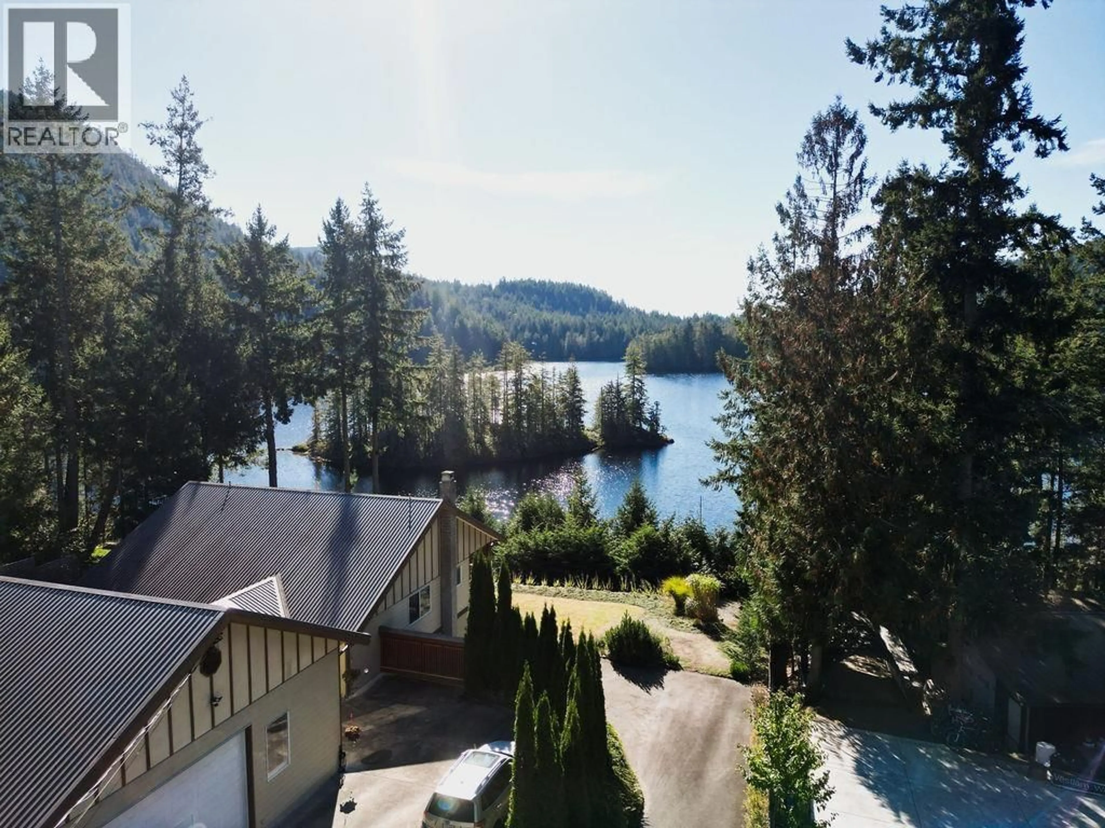 A pic from outside/outdoor area/front of a property/back of a property/a pic from drone, water/lake/river/ocean view for 5090 ELLIOT ROAD, Garden Bay British Columbia V0N1S1