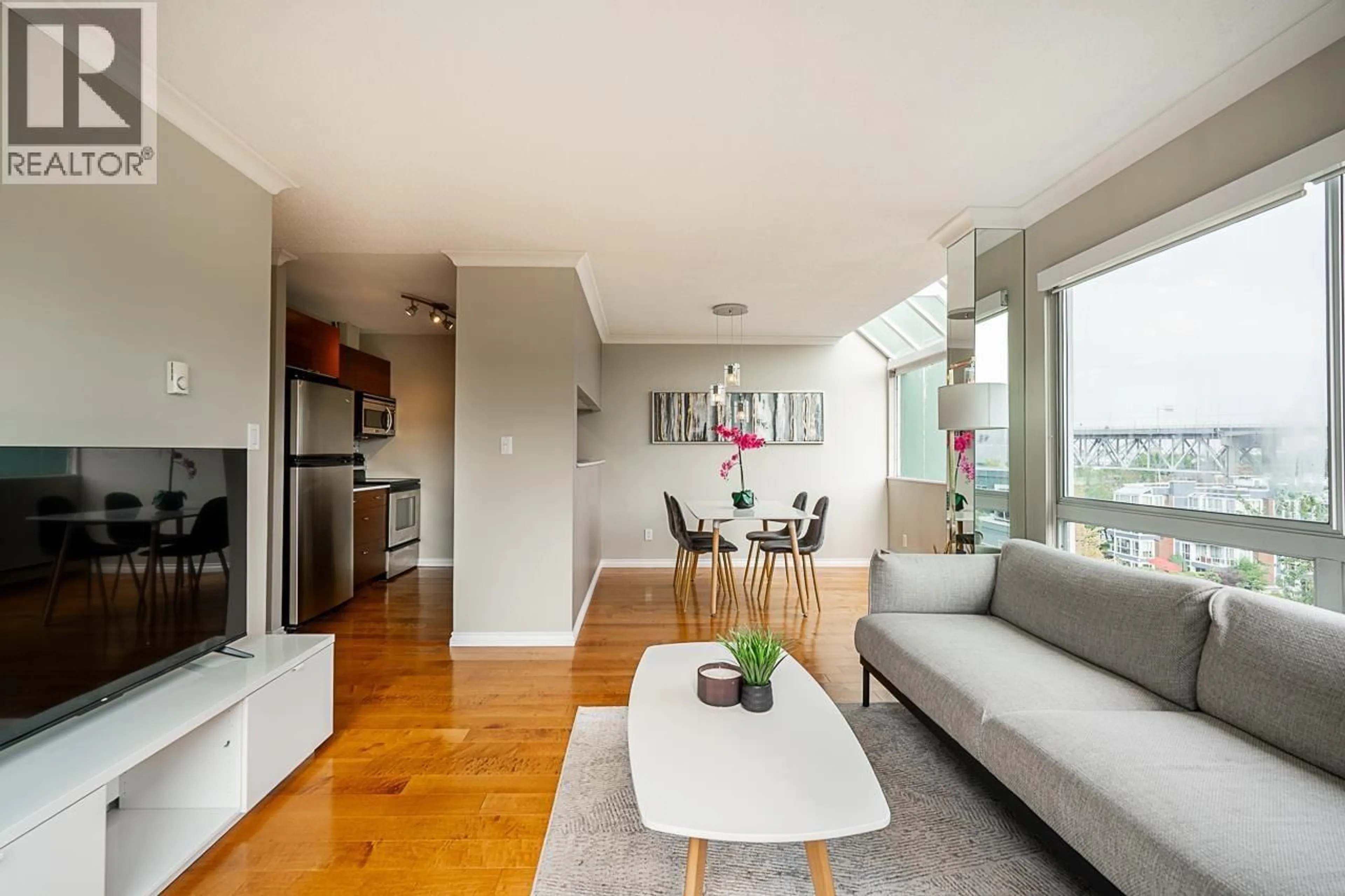 Living room with furniture, wood/laminate floor for 601 - 1510 1ST AVENUE, Vancouver British Columbia V6J4S3