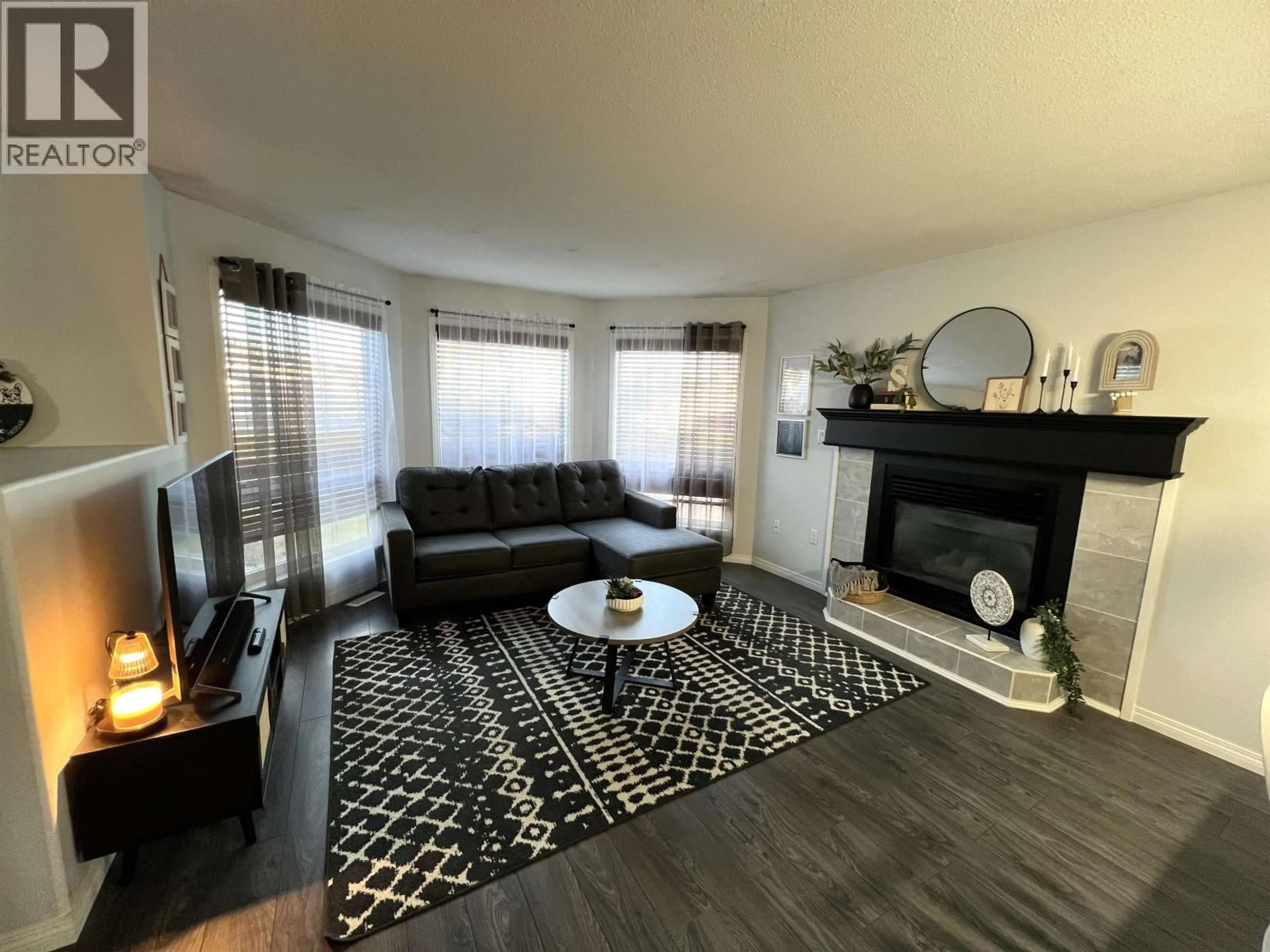 Living room with furniture, unknown for 5516 57 STREET, Fort Nelson British Columbia V0C1R0