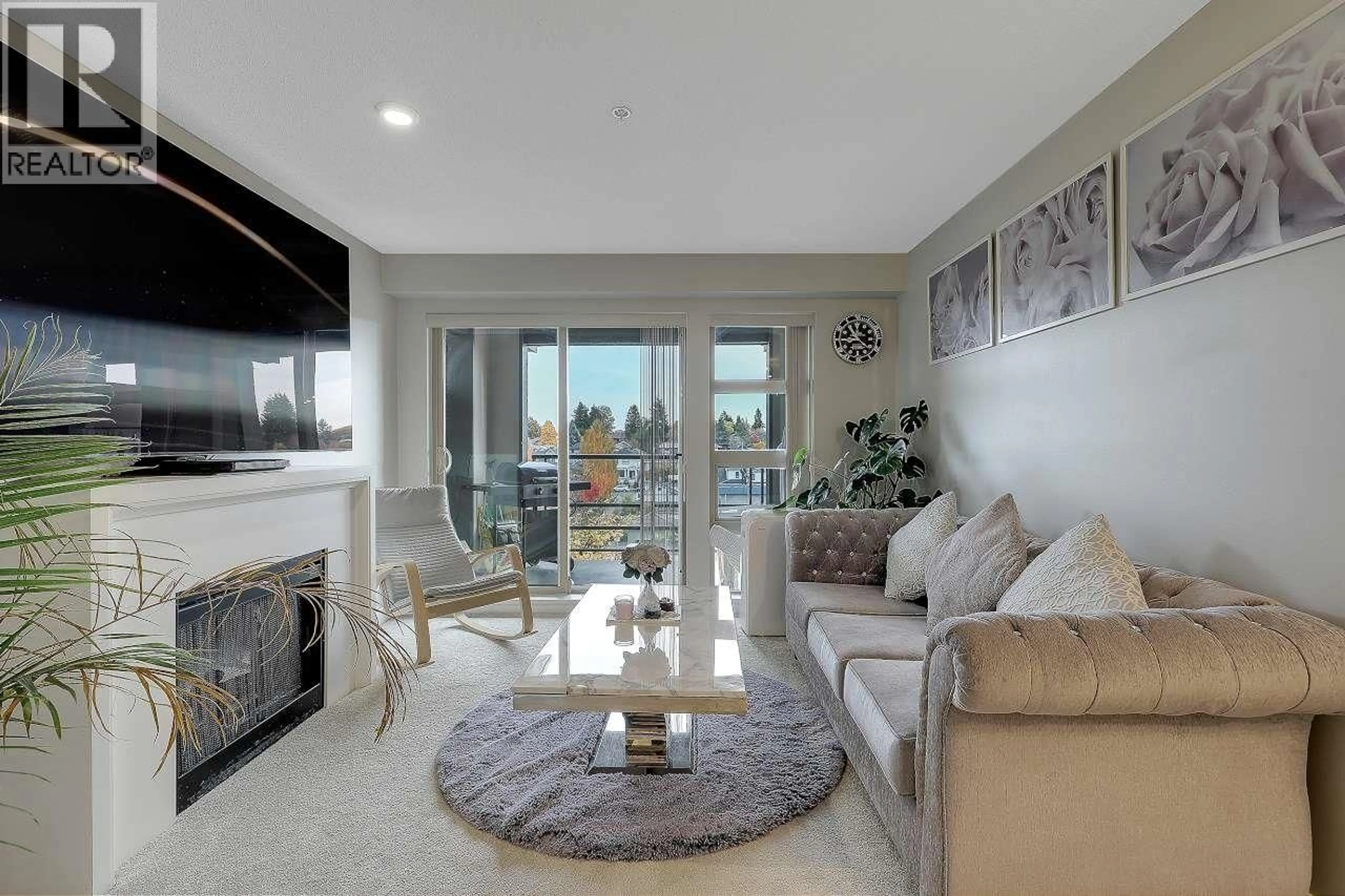 Living room with furniture, unknown for 320 - 4550 FRASER STREET, Vancouver British Columbia V5V4G8