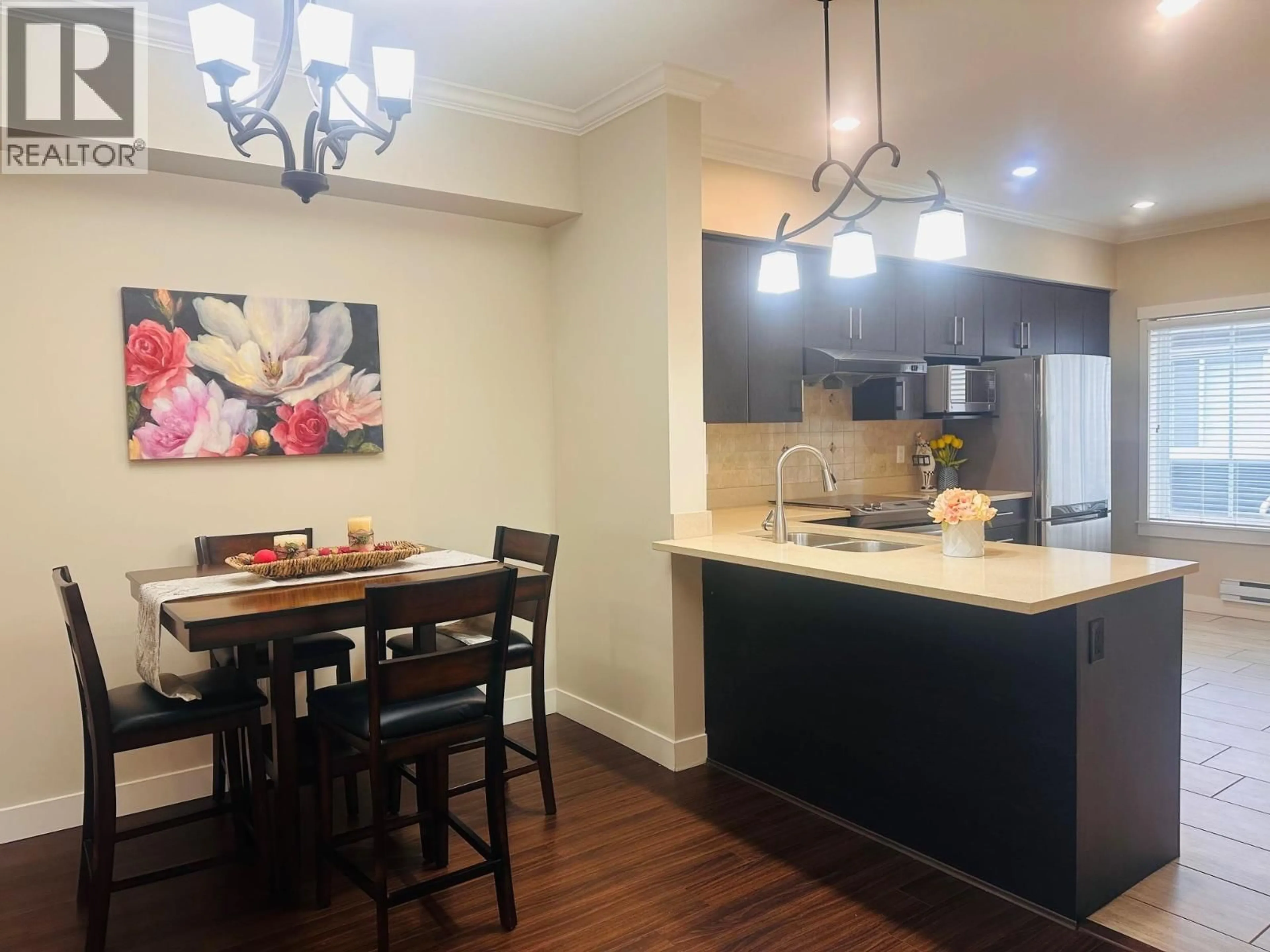 Open concept kitchen, wood/laminate floor for 16 - 9811 FERNDALE ROAD, Richmond British Columbia V6Y1X4