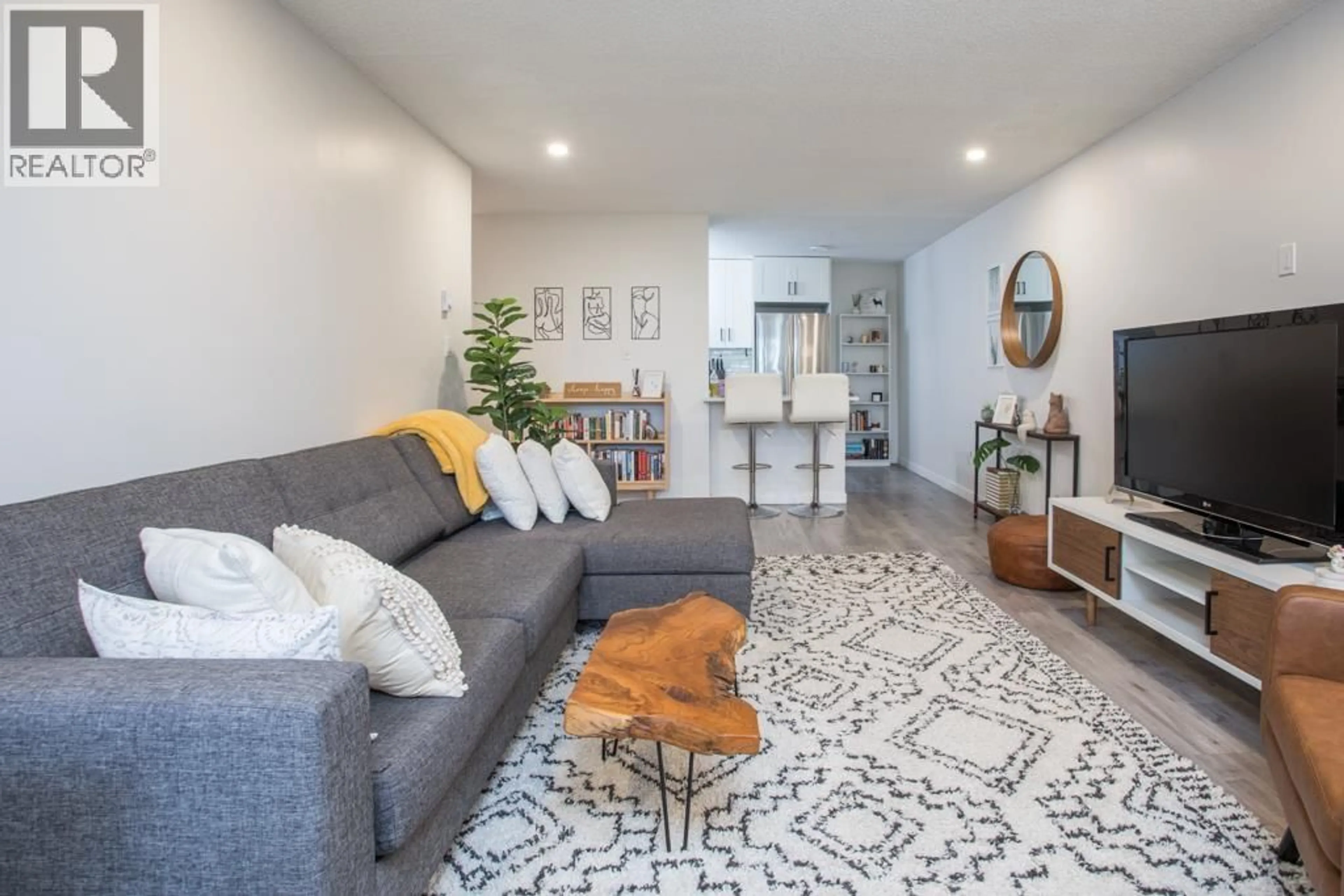 Living room with furniture, unknown for 309 - 7151 EDMONDS STREET, Burnaby British Columbia V3N4N5