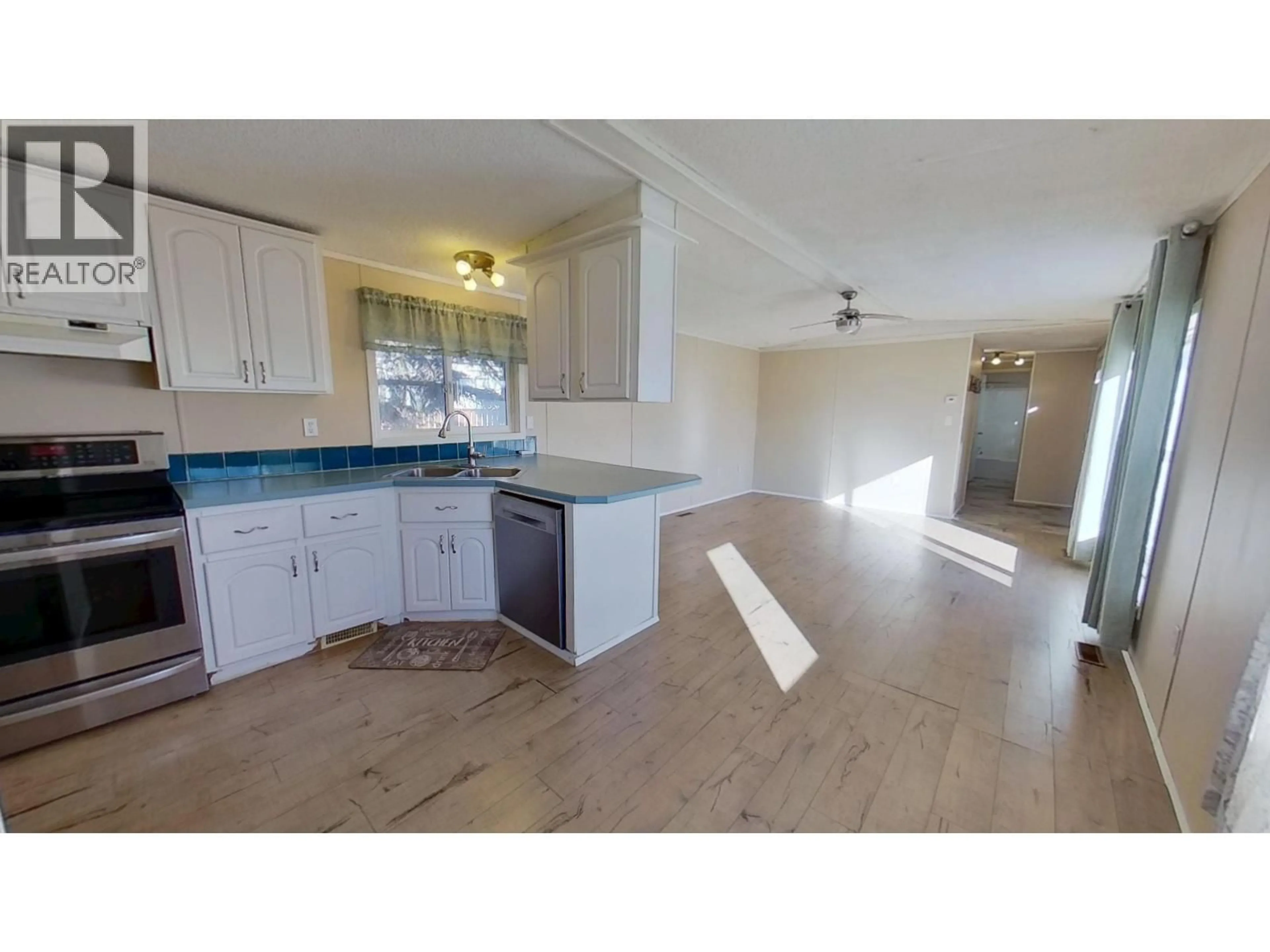 Open concept kitchen, unknown for 140 - 9207 82 STREET, Fort St. John British Columbia V1J5G5