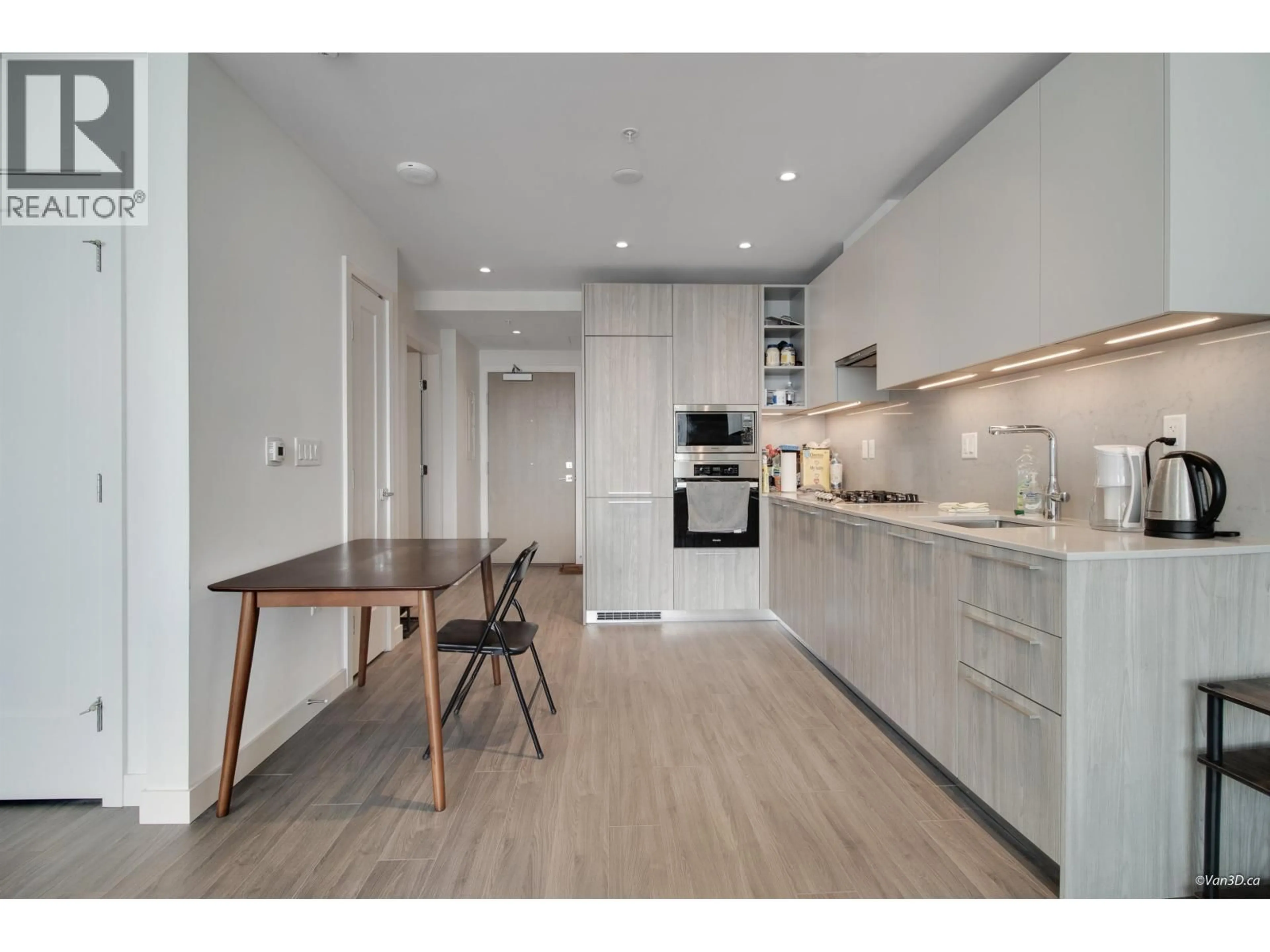 Open concept kitchen, wood/laminate floor for 2703 - 6699 DUNBLANE AVENUE, Burnaby British Columbia V5H0J8