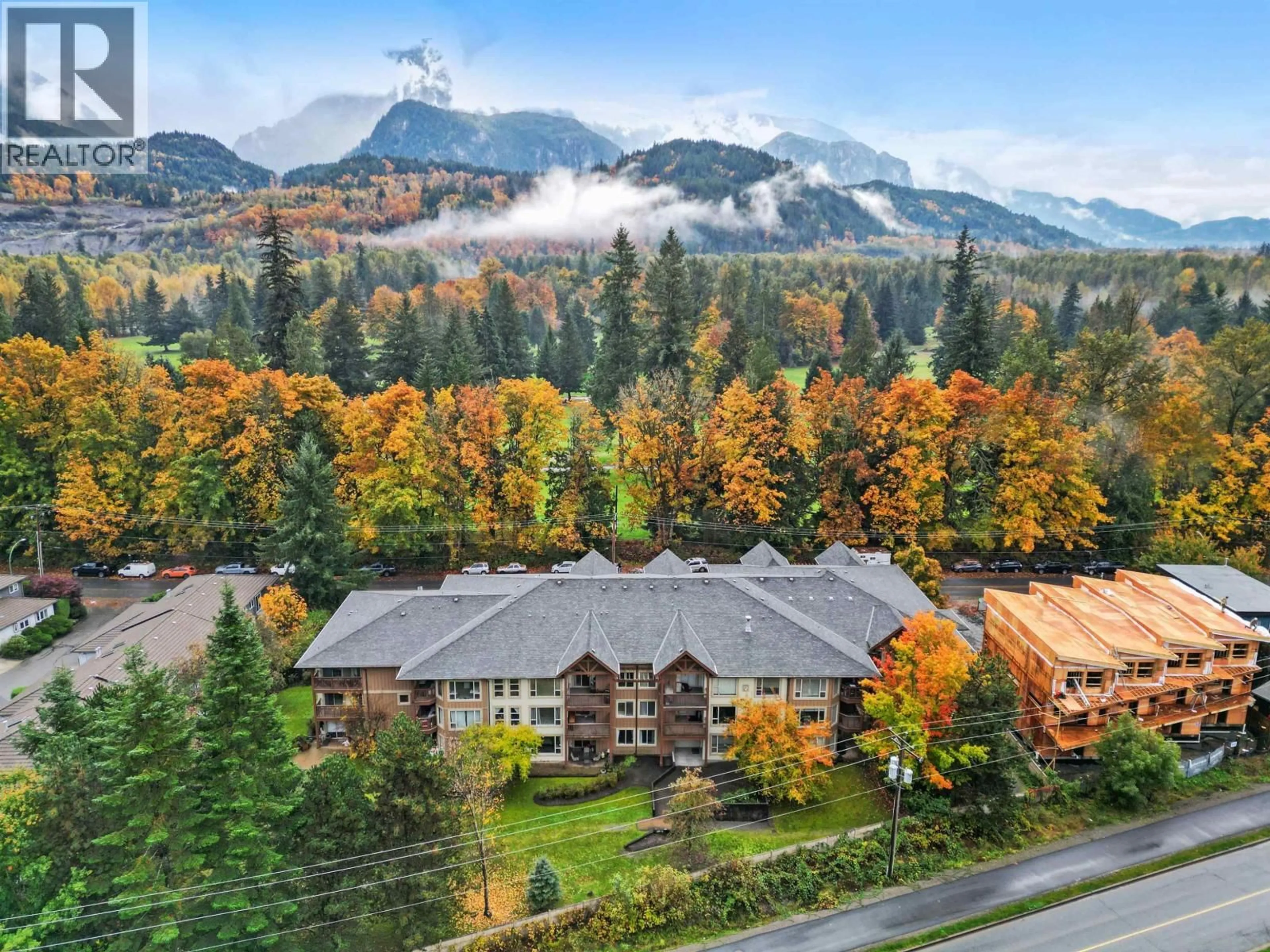 A pic from outside/outdoor area/front of a property/back of a property/a pic from drone, mountain view for 208 - 2323 MAMQUAM ROAD, Squamish British Columbia V8B0H9