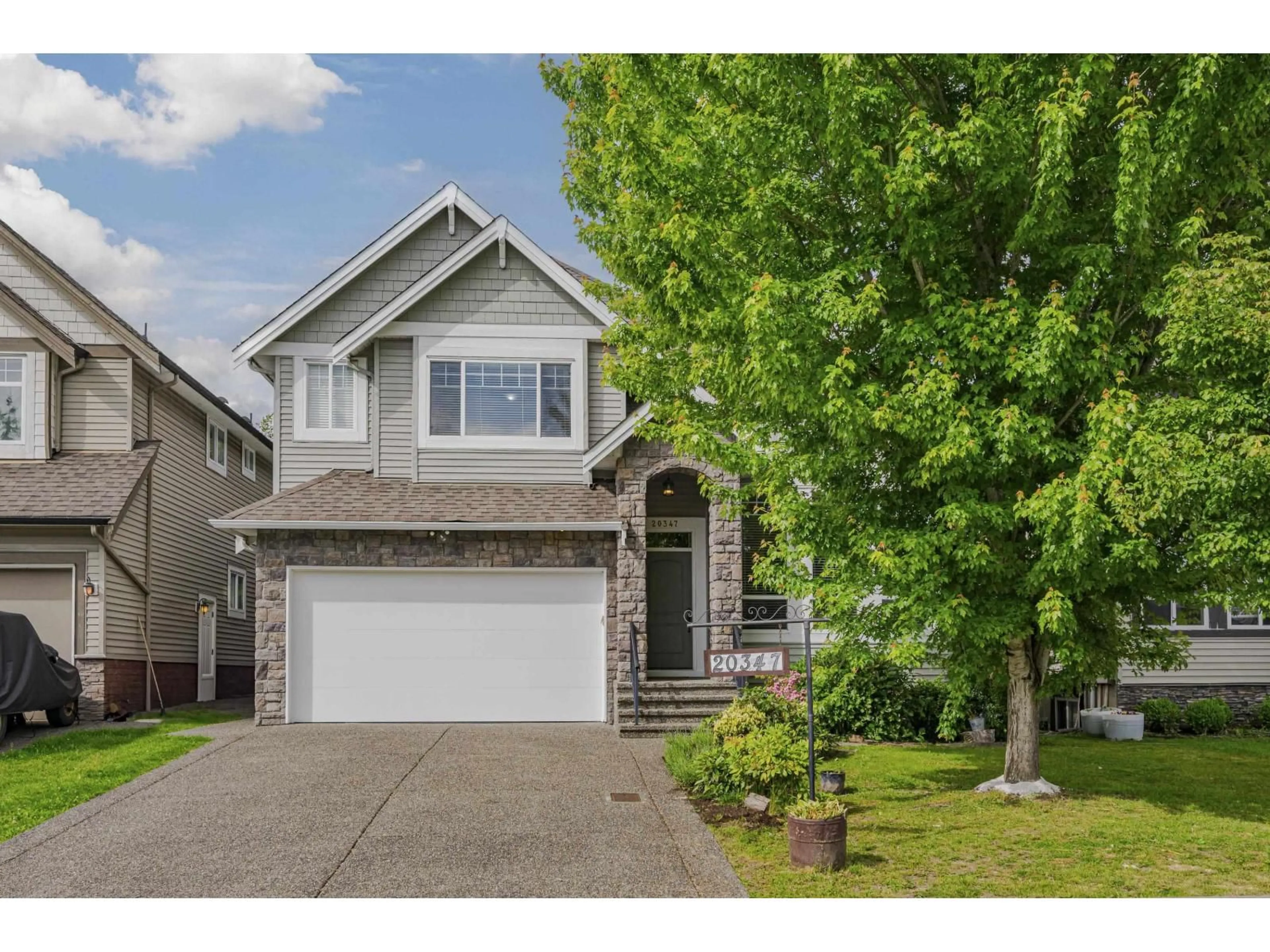 Home with vinyl exterior material, street for 20347 98A, Langley British Columbia V1M0A6