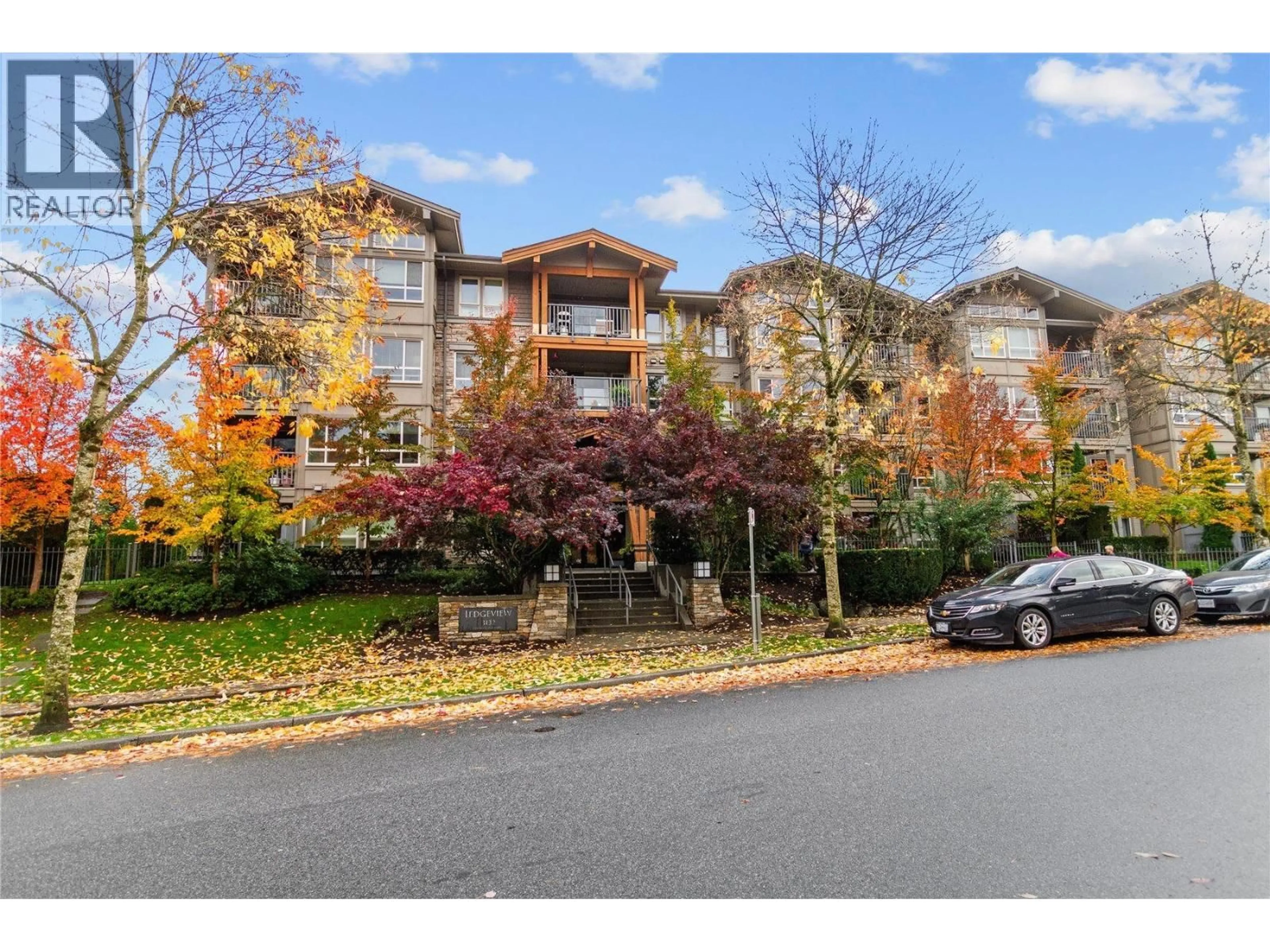 A pic from outside/outdoor area/front of a property/back of a property/a pic from drone, unknown for 302 - 3132 DAYANEE SPRINGS BOULEVARD, Coquitlam British Columbia V3E0A2