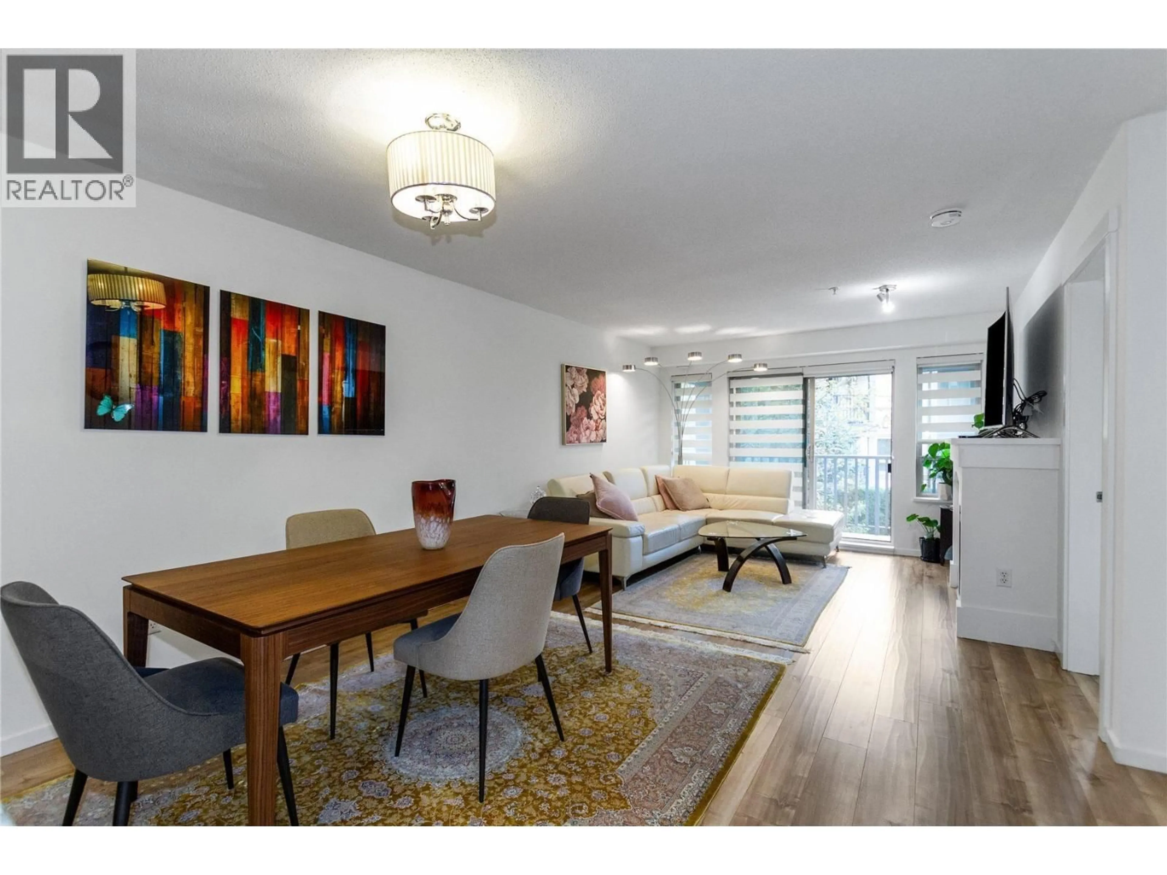 Dining room, wood/laminate floor for 302 - 3132 DAYANEE SPRINGS BOULEVARD, Coquitlam British Columbia V3E0A2