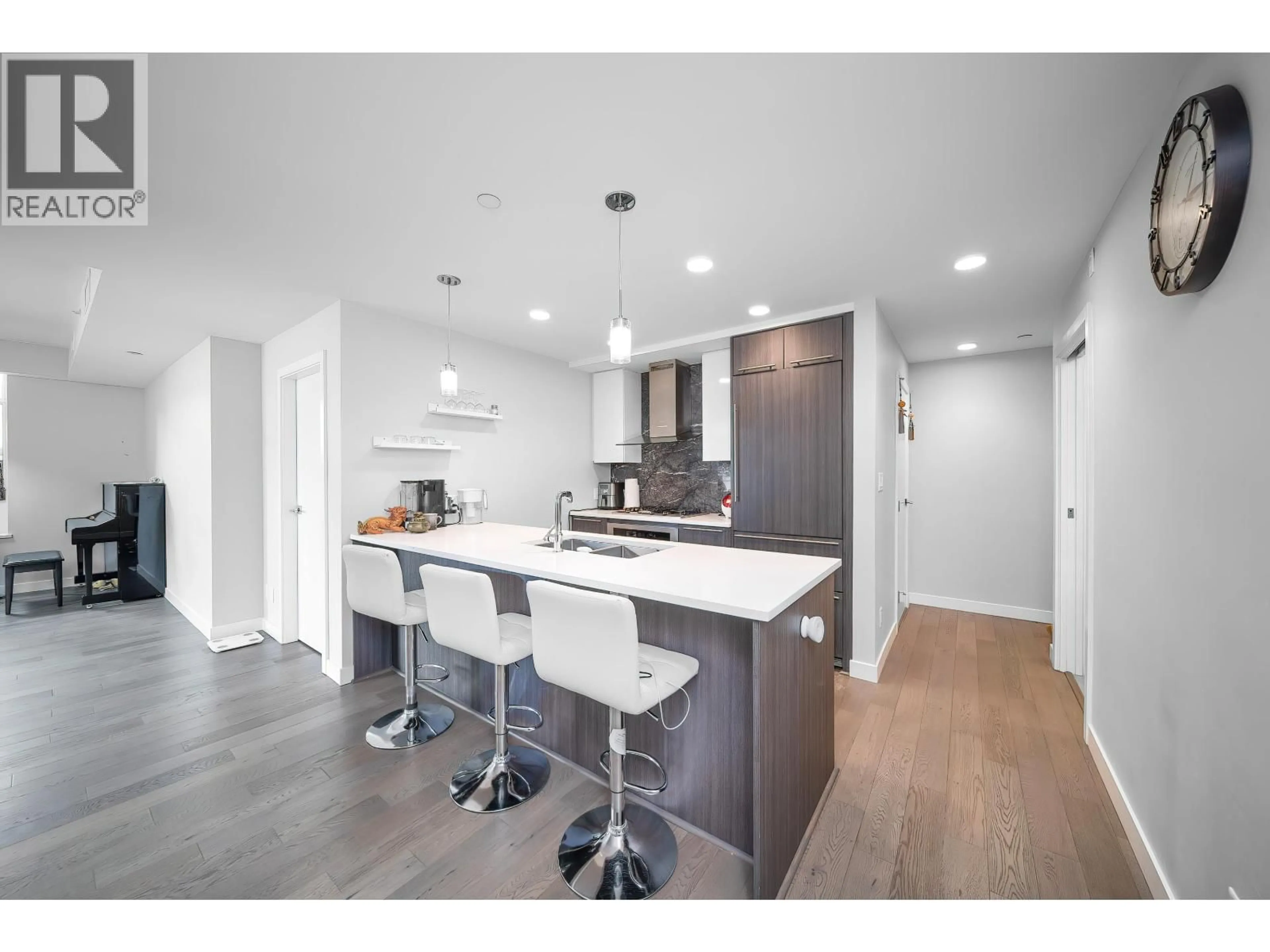 Open concept kitchen, wood/laminate floor for 209 - 4963 CAMBIE STREET, Vancouver British Columbia V5Z2Z6