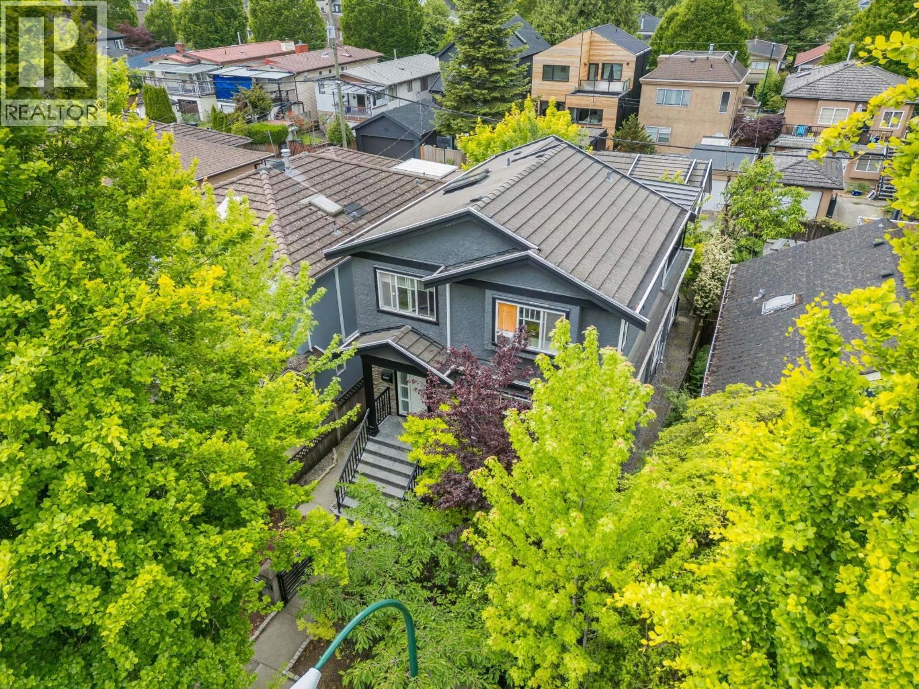 A pic from outside/outdoor area/front of a property/back of a property/a pic from drone, street for 5187 SHERBROOKE STREET, Vancouver British Columbia V5W3M3
