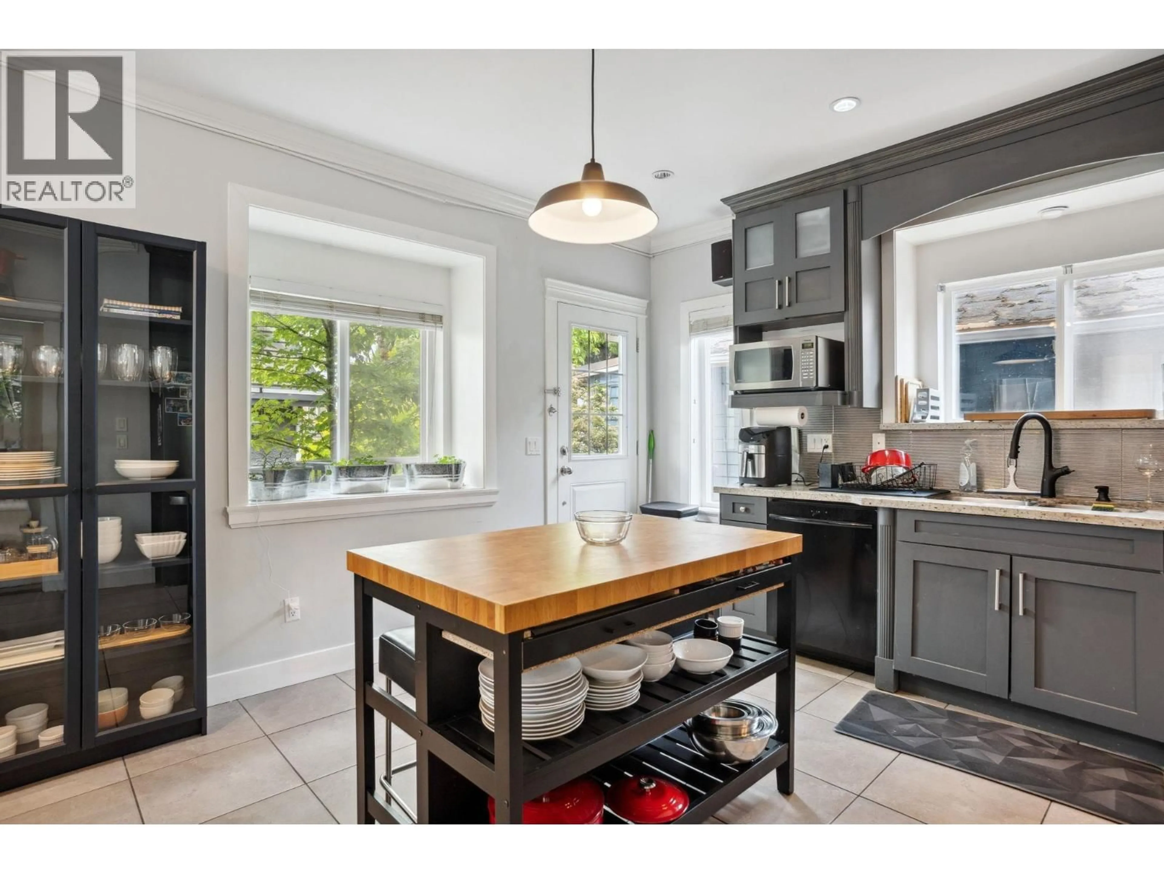 Open concept kitchen, ceramic/tile floor for 5187 SHERBROOKE STREET, Vancouver British Columbia V5W3M3