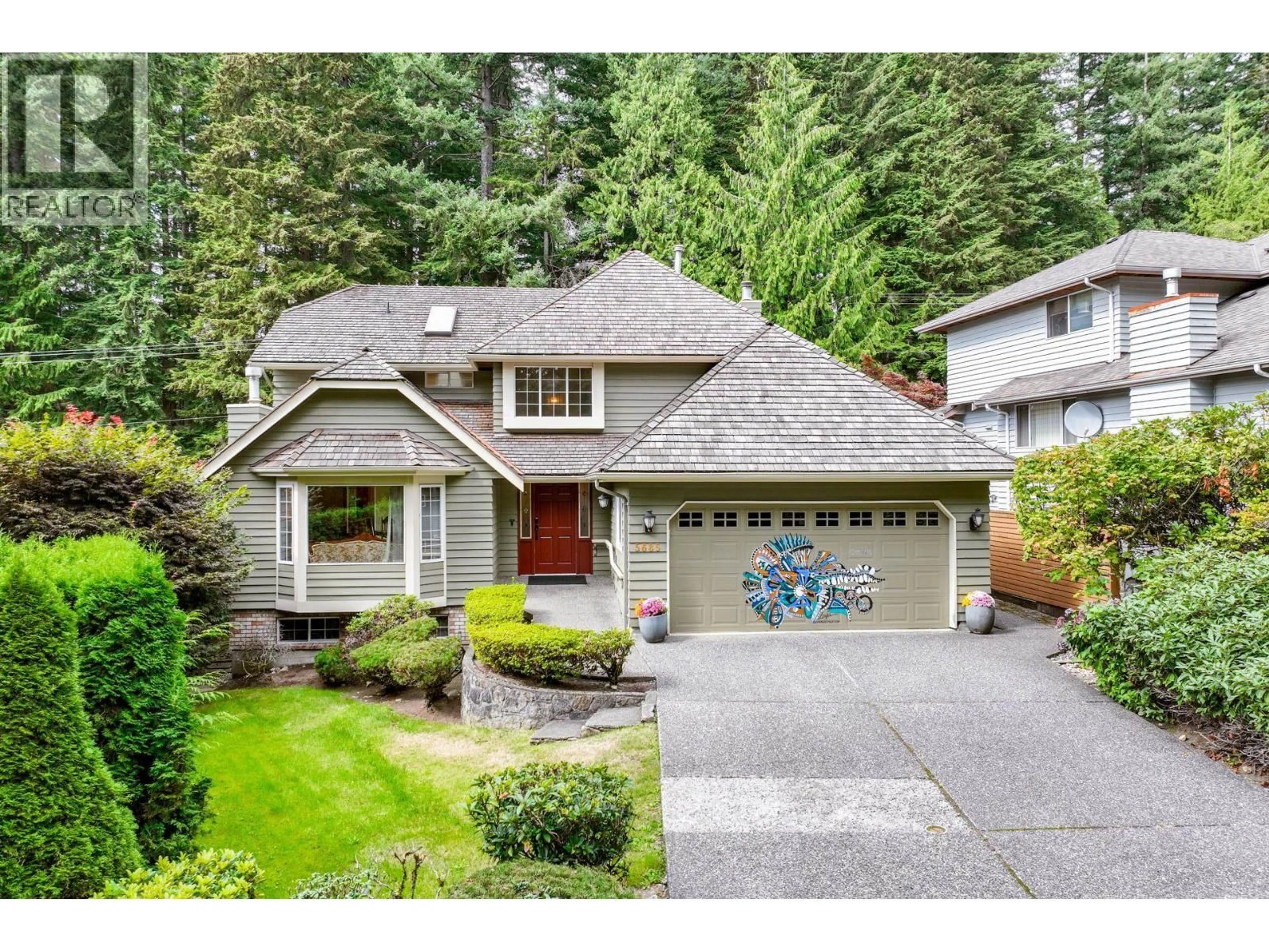 Home with vinyl exterior material, street for 5685 NANCY GREENE WAY, North Vancouver British Columbia V7R4W2