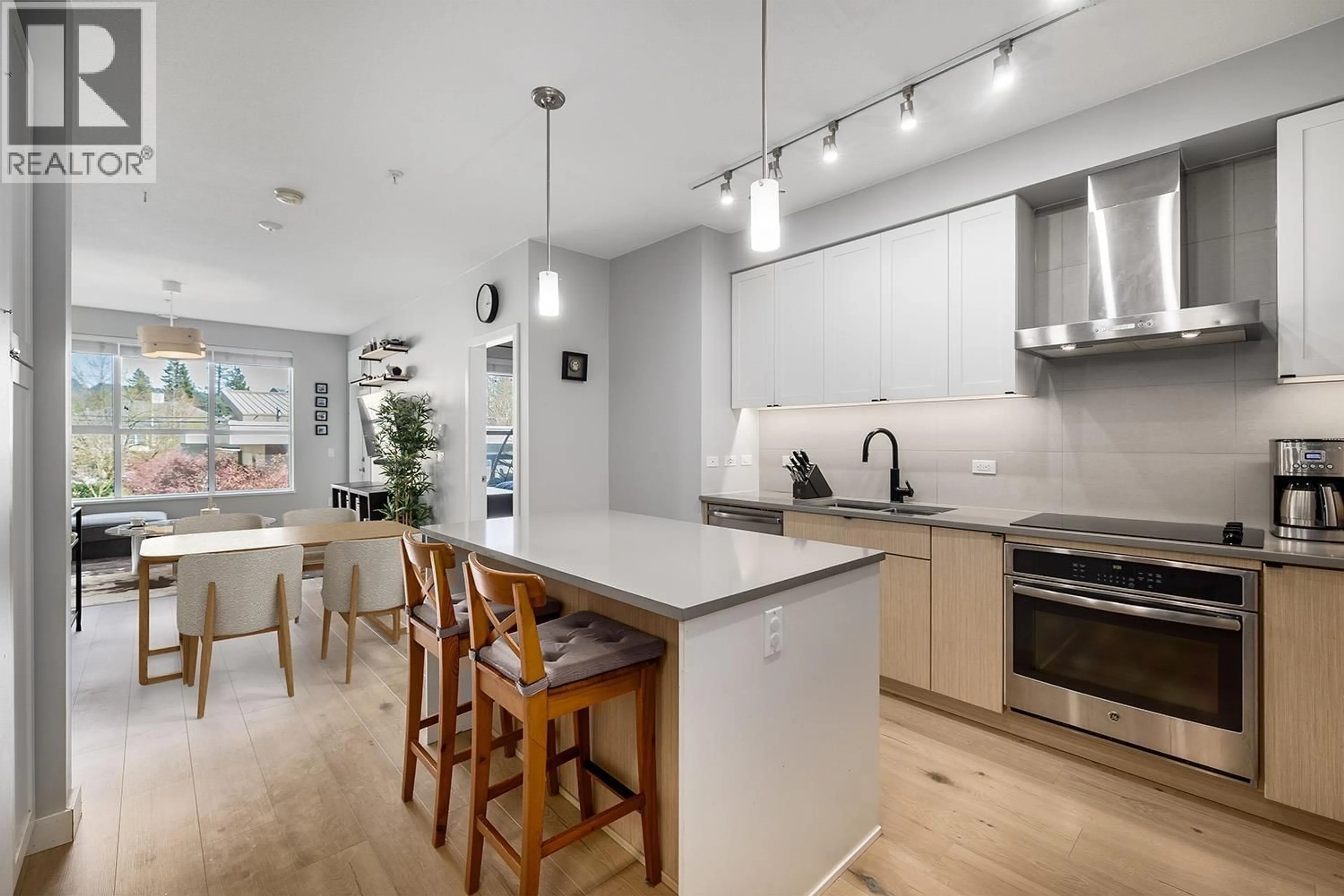Open concept kitchen, unknown for 207 - 3205 MOUNTAIN HIGHWAY, North Vancouver British Columbia V7K0A3