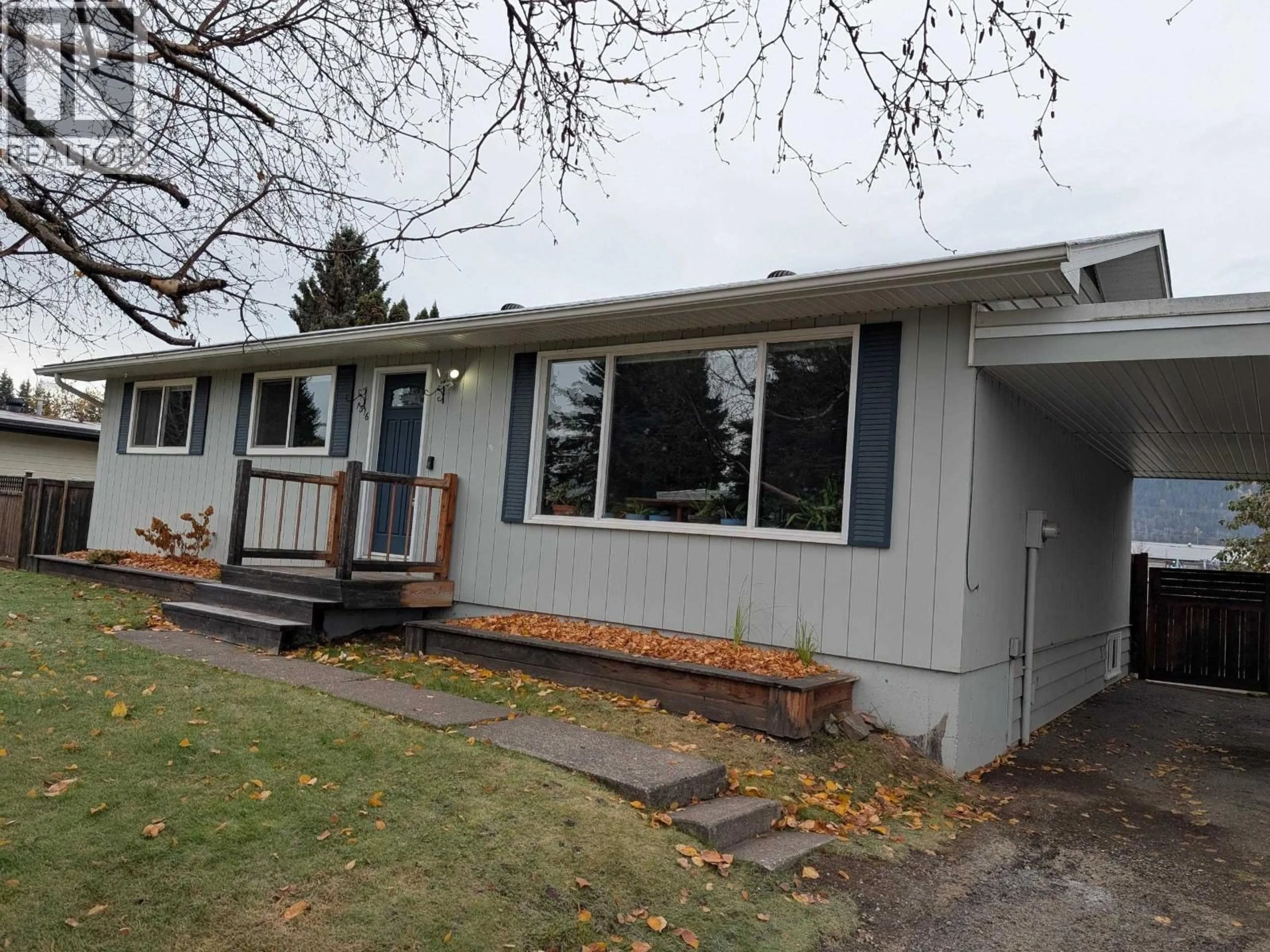 Home with vinyl exterior material, street for 1316 MORICE DRIVE, Smithers British Columbia V0J2N0