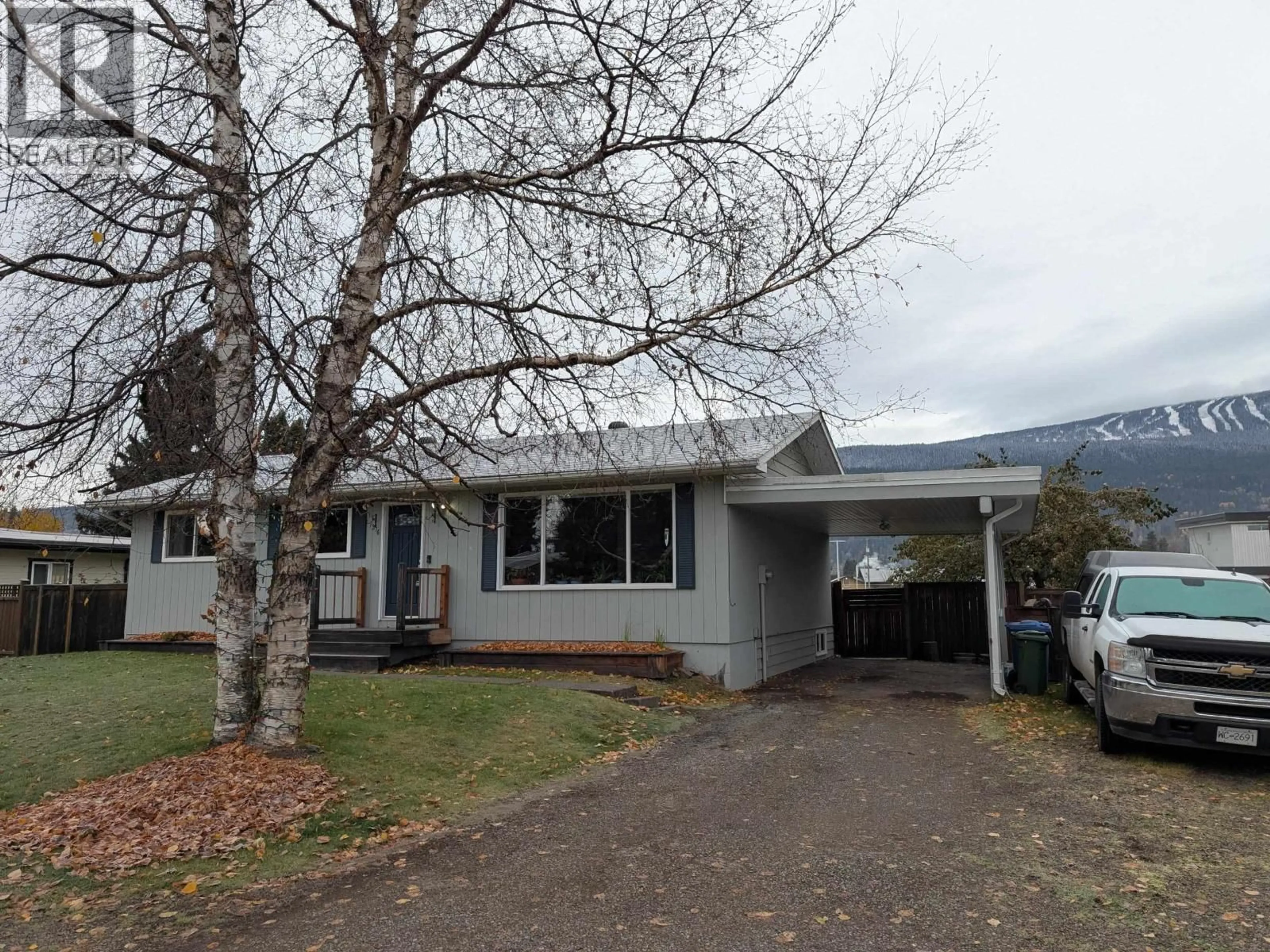 Home with vinyl exterior material, street for 1316 MORICE DRIVE, Smithers British Columbia V0J2N0