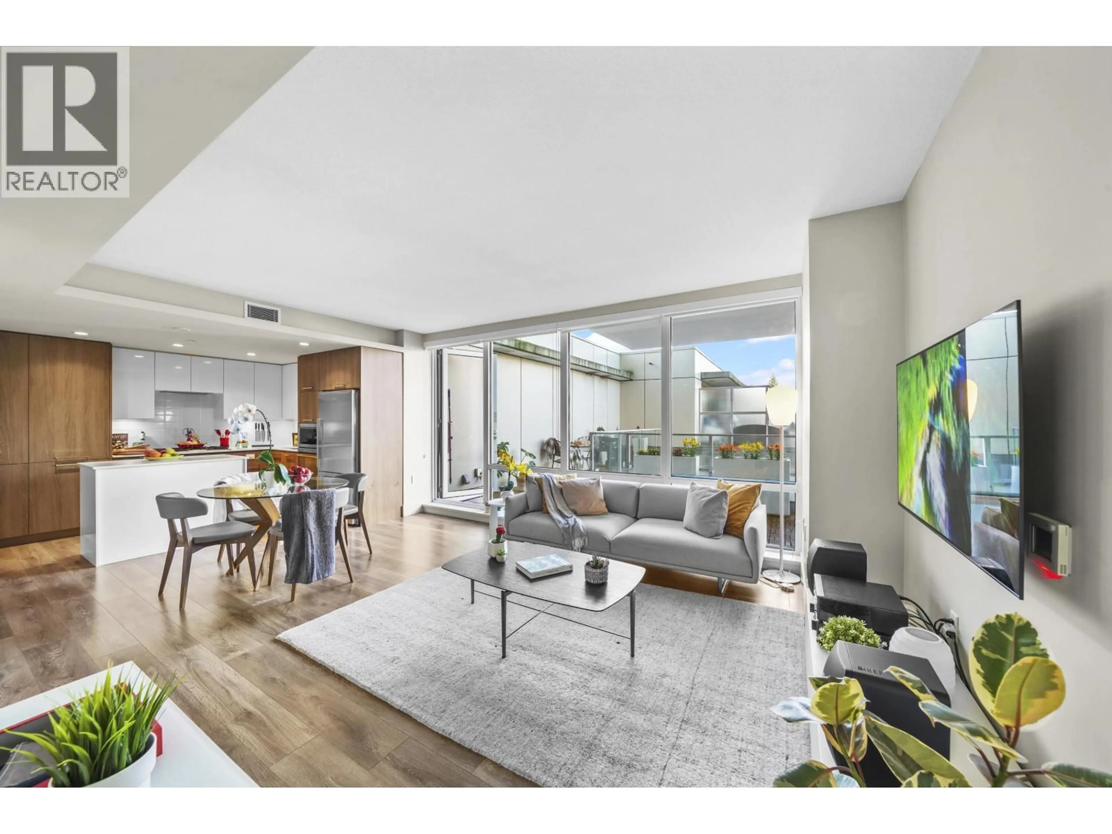 Living room with furniture, unknown for 616 - 680 SEYLYNN CRESCENT, North Vancouver British Columbia V7J0B5