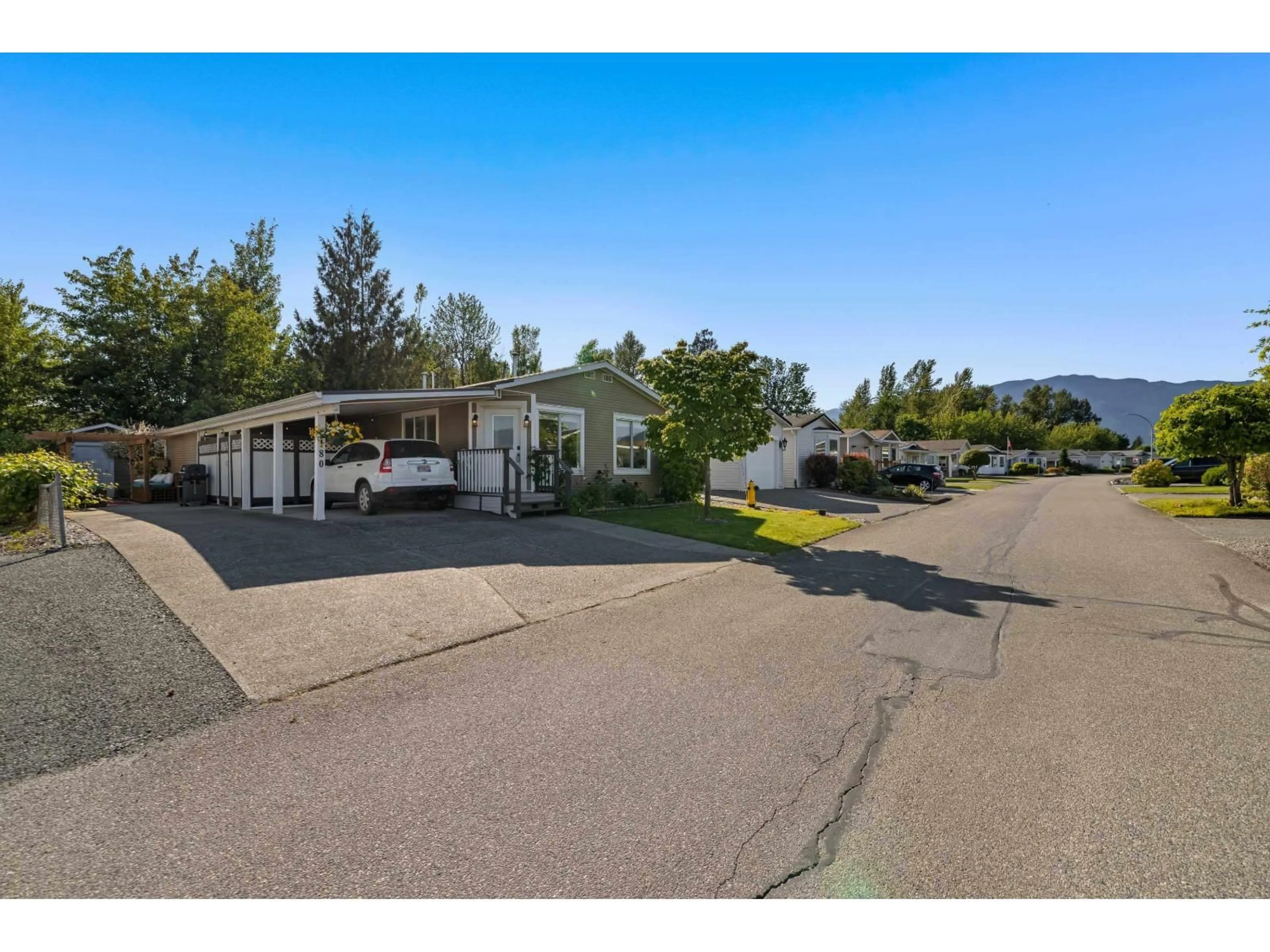A pic from outside/outdoor area/front of a property/back of a property/a pic from drone, mountain view for 180 - 9055 ASHWELL ROAD, Chilliwack British Columbia V2P7S6