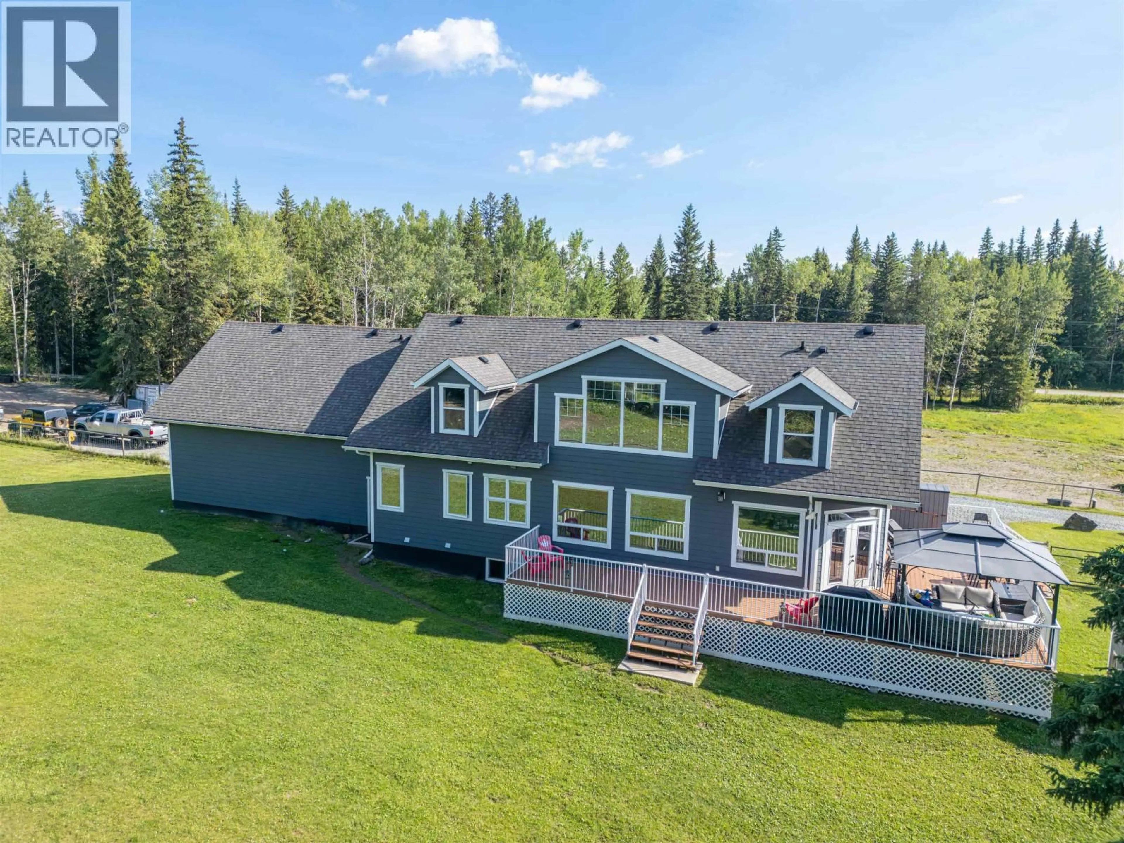 A pic from outside/outdoor area/front of a property/back of a property/a pic from drone, unknown for 3900 15 MILE ROAD, Prince George British Columbia V2N5Y4