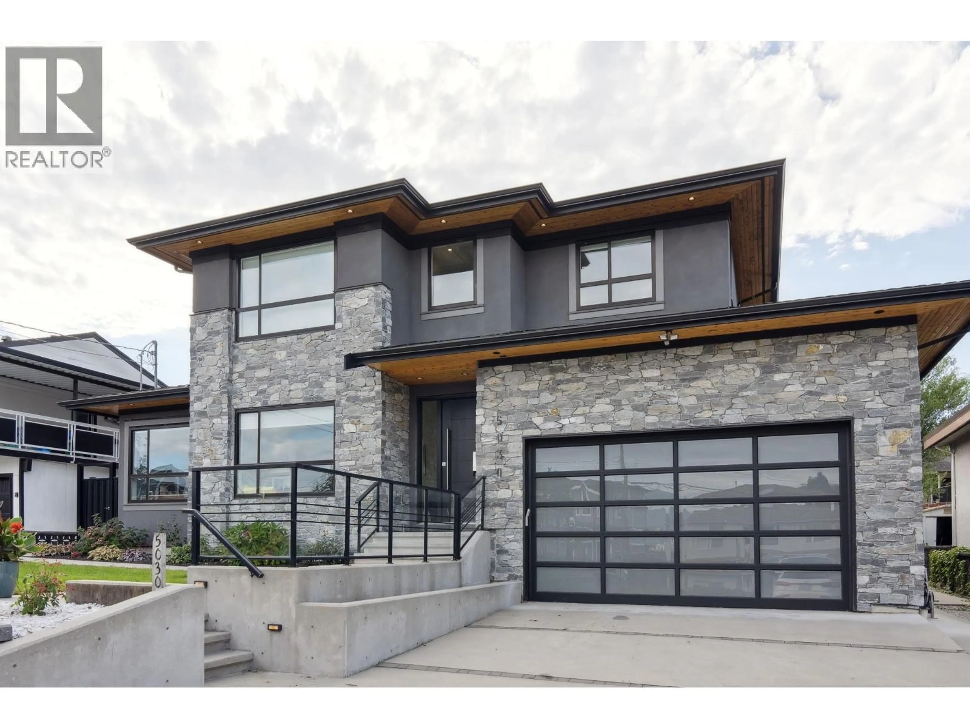 Home with brick exterior material, street for 5030 HARDWICK STREET, Burnaby British Columbia V5G1P7