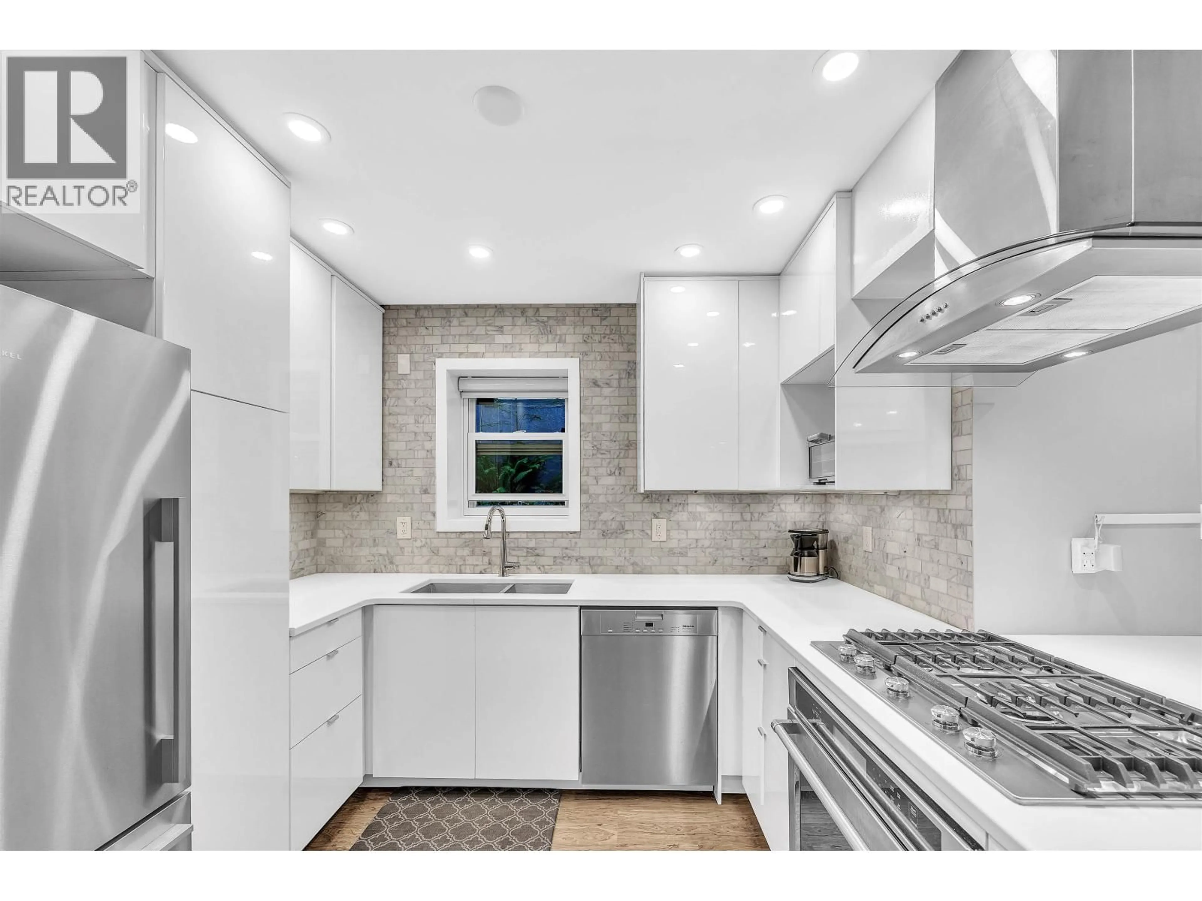 Contemporary kitchen, ceramic/tile floor for 2433 6TH AVENUE, Vancouver British Columbia V6K1W2