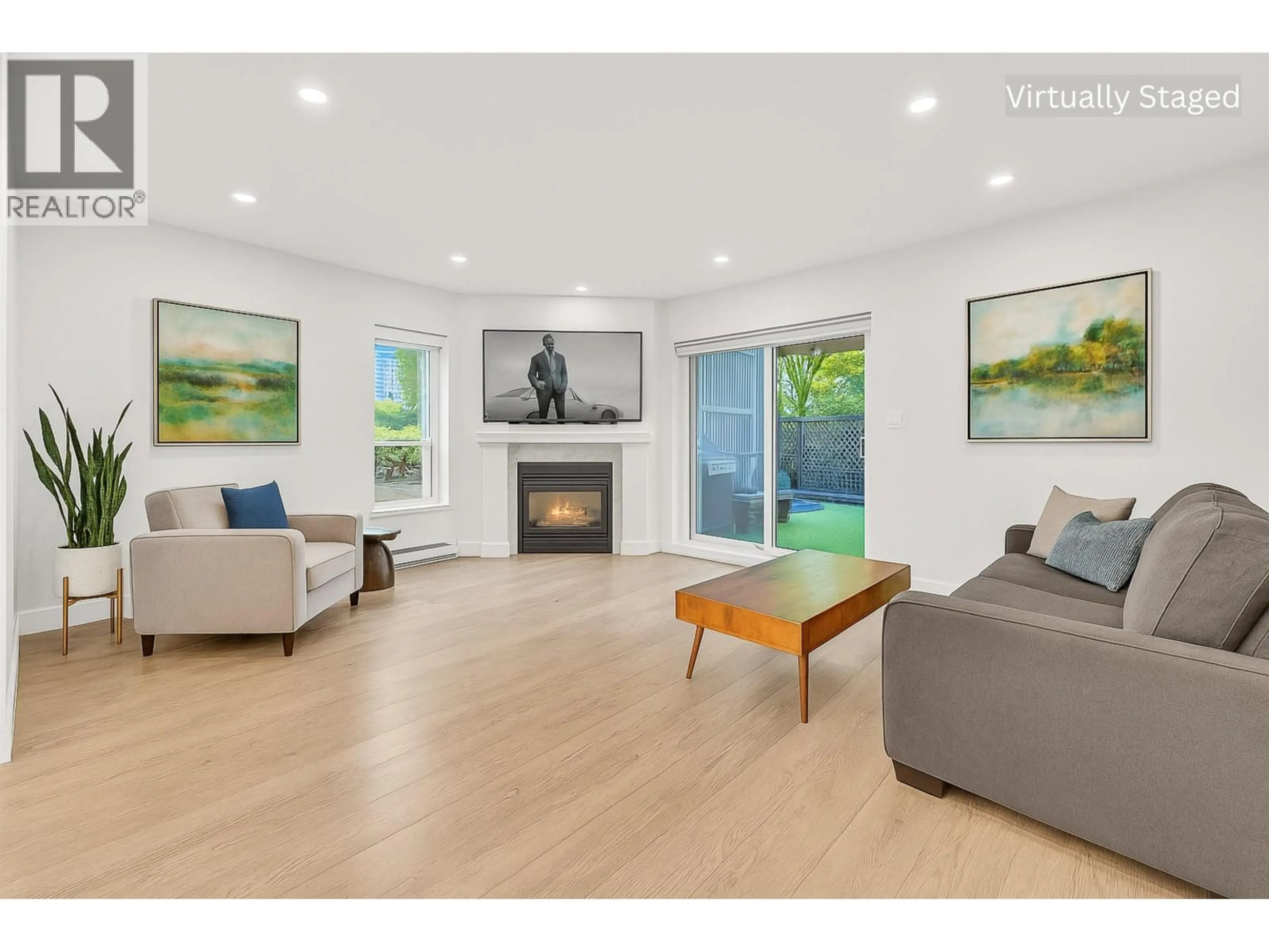 Living room with furniture, wood/laminate floor for 2433 6TH AVENUE, Vancouver British Columbia V6K1W2