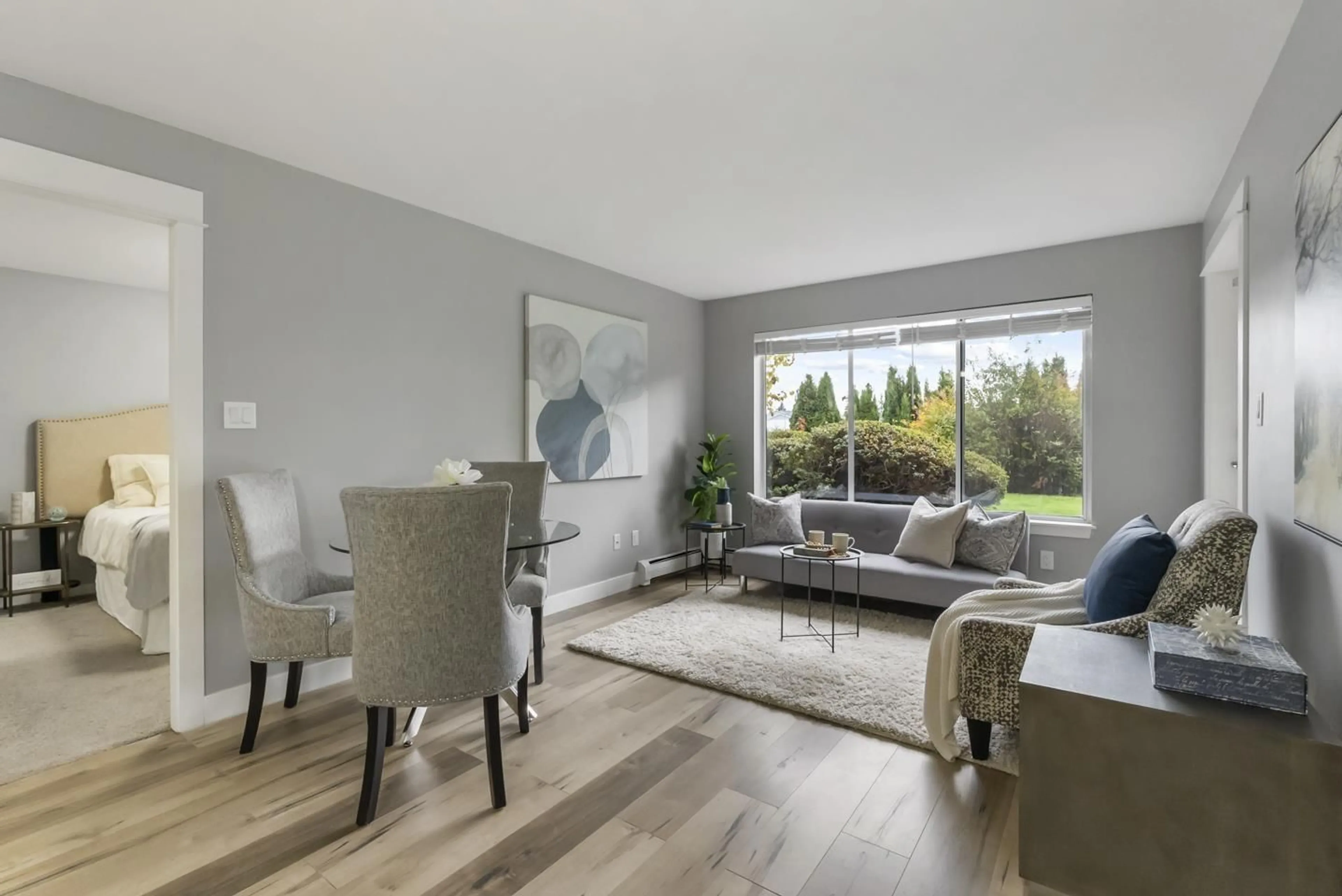 Living room with furniture, wood/laminate floor for 118 - 32725 GEORGE FERGUSON, Abbotsford British Columbia V2T5M5